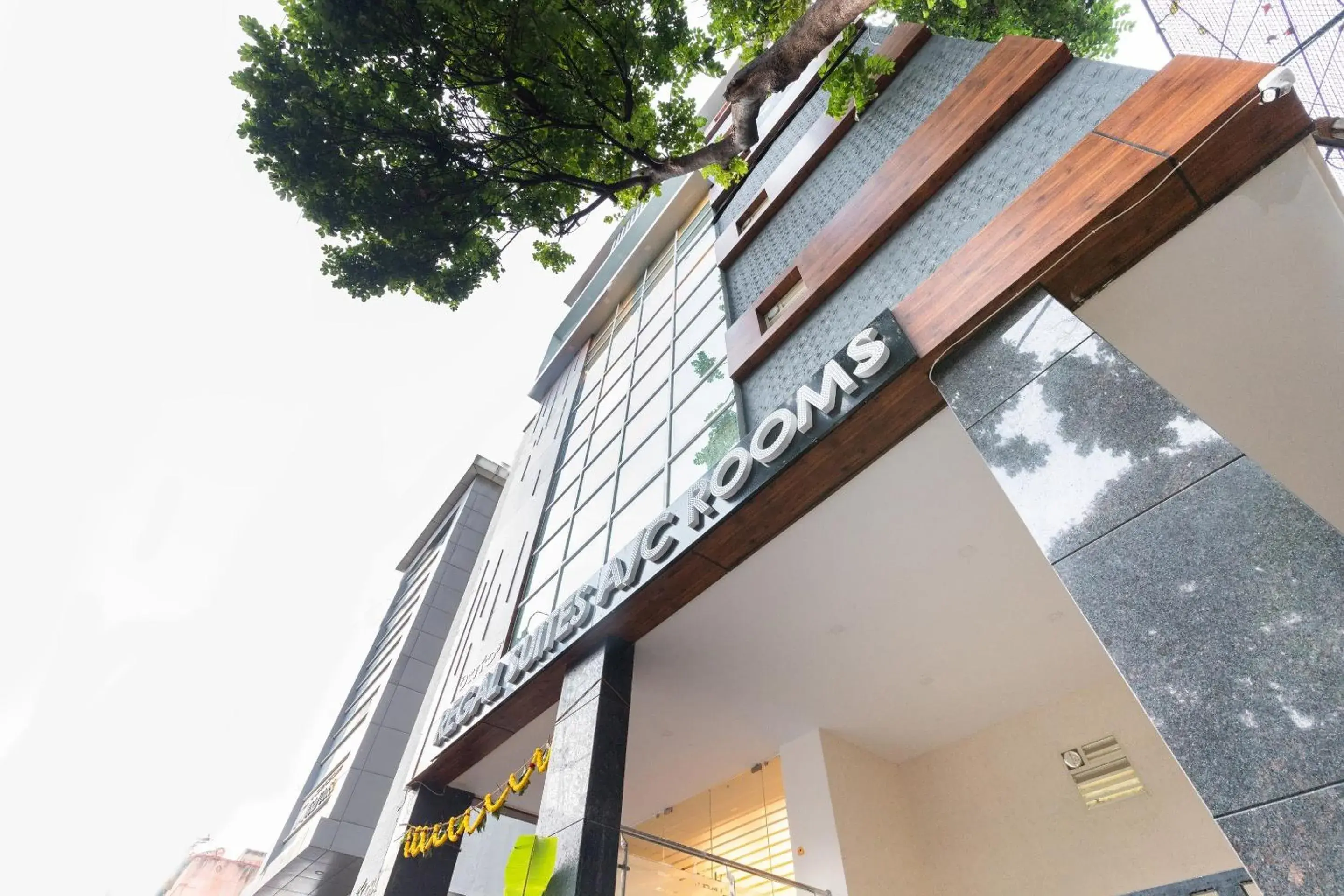 Facade/entrance in Capital O Regal suites Facade/entrance in Capital O Regal suites