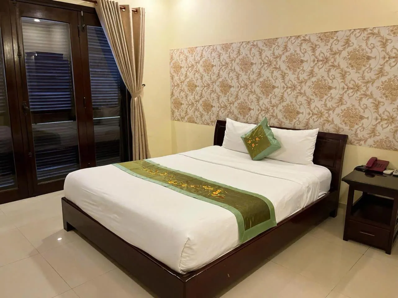 Bed in Golden River Hotel