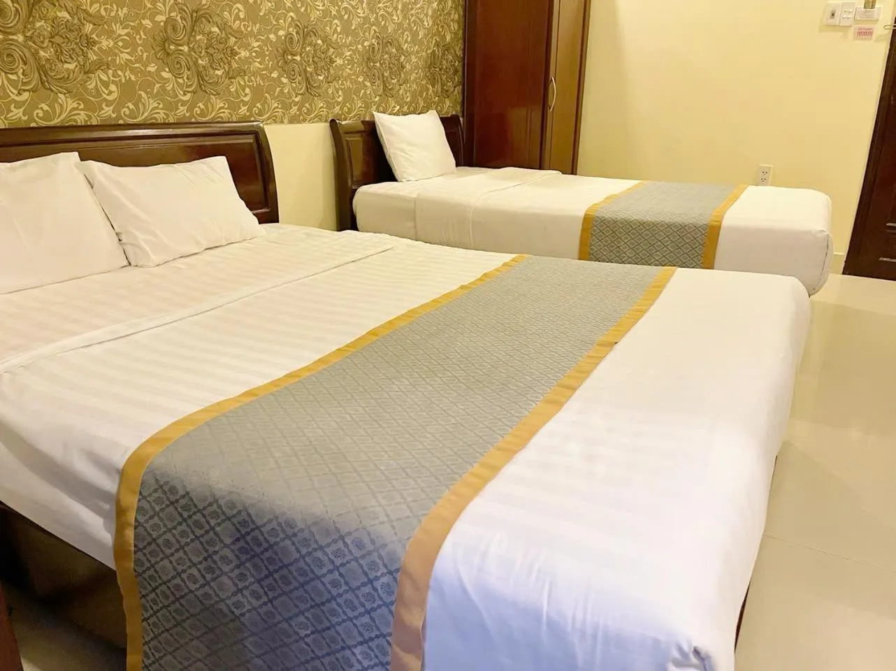 Bed in Golden River Hotel
