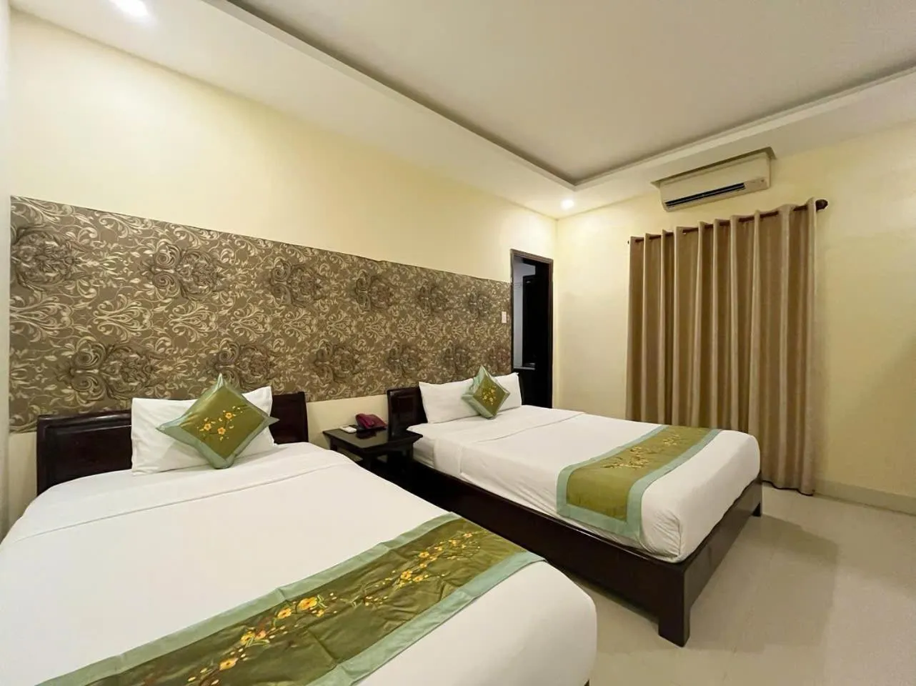 Bed in Golden River Hotel