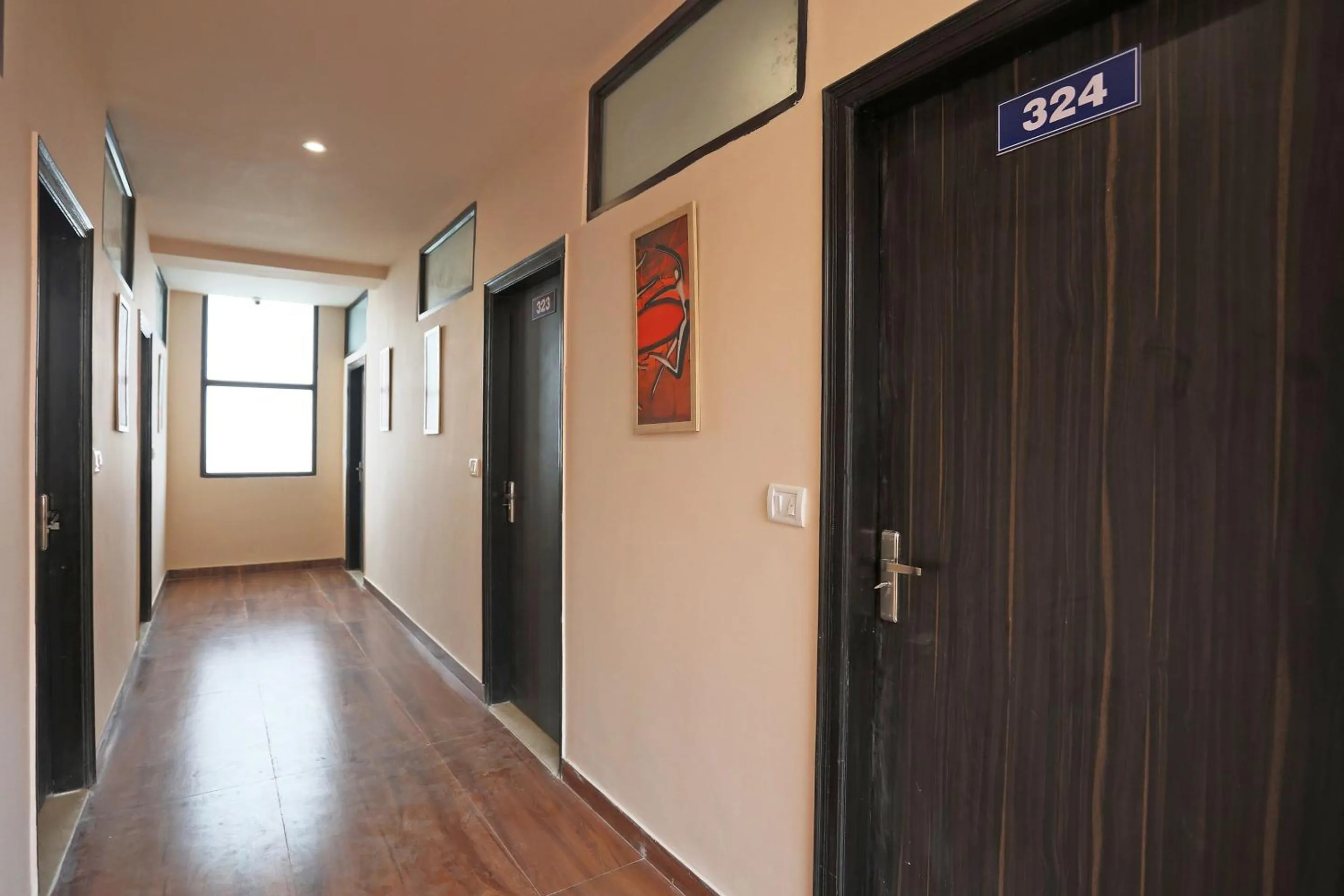 Bedroom in Hotel O DSG Residency