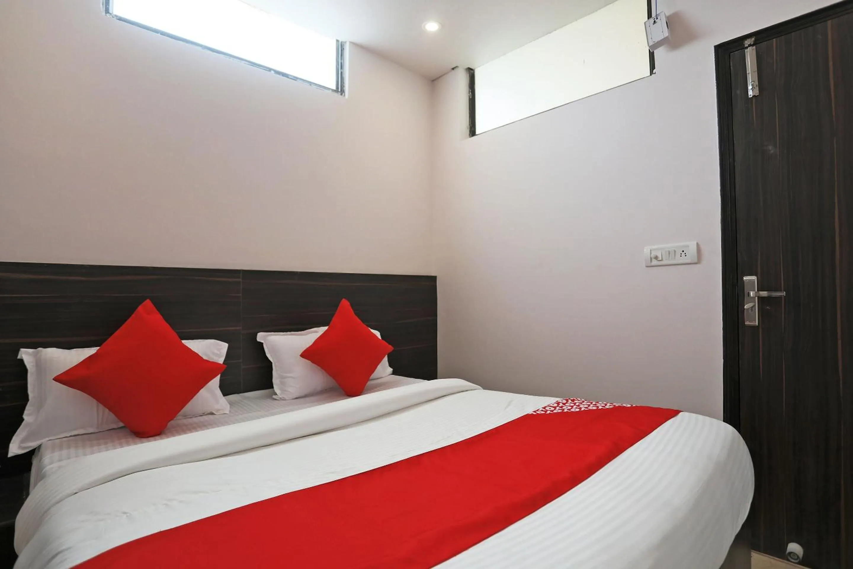 Bedroom in Hotel O DSG Residency