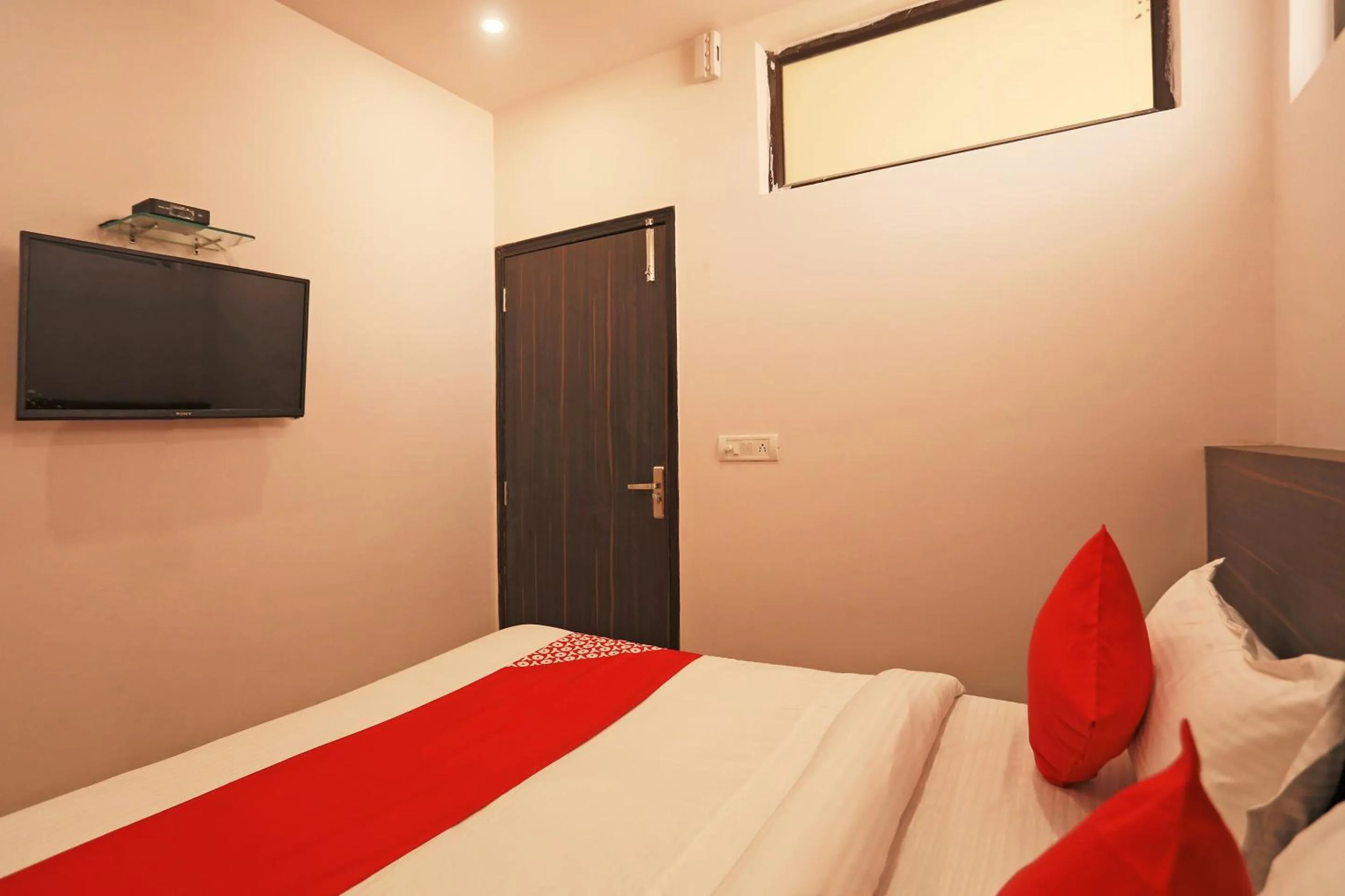 Bedroom in Hotel O DSG Residency