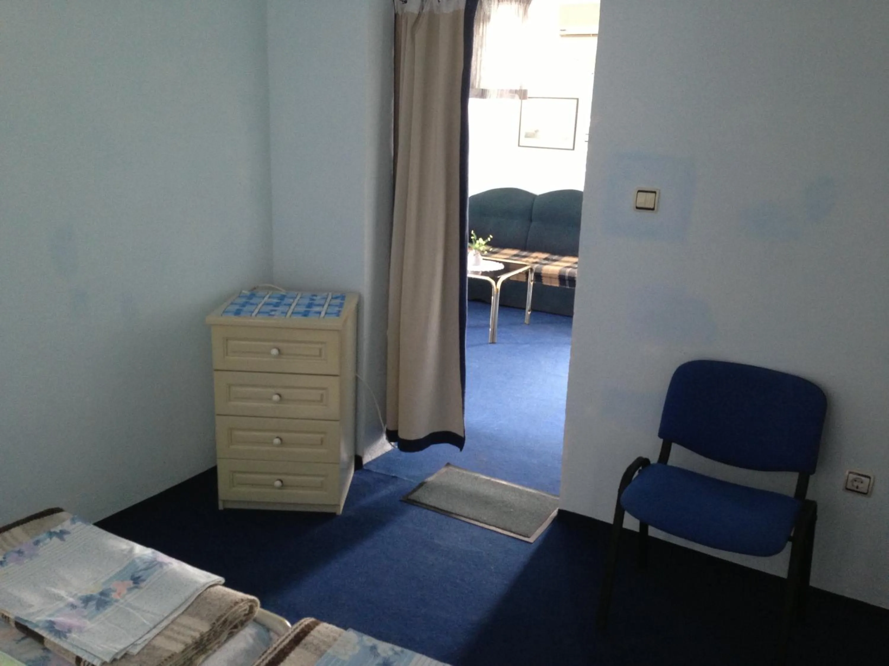 Living room, Bed in Andi Hotel