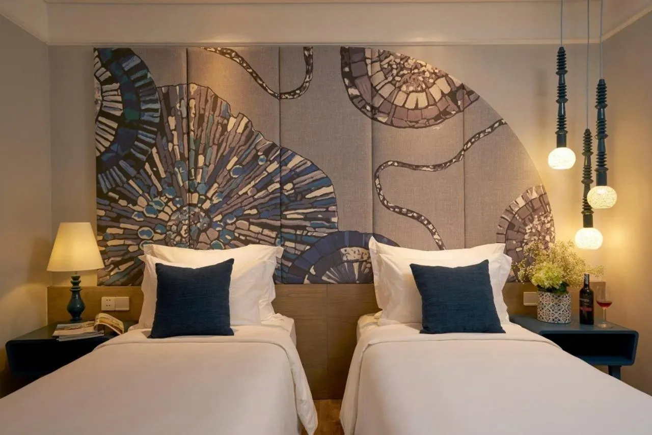 Bedroom, Bed in Sofiana My Khe Hotel & Spa - Rooftop Pool Bar - Free 01 Draught Beer and 20-minute Spa per Room