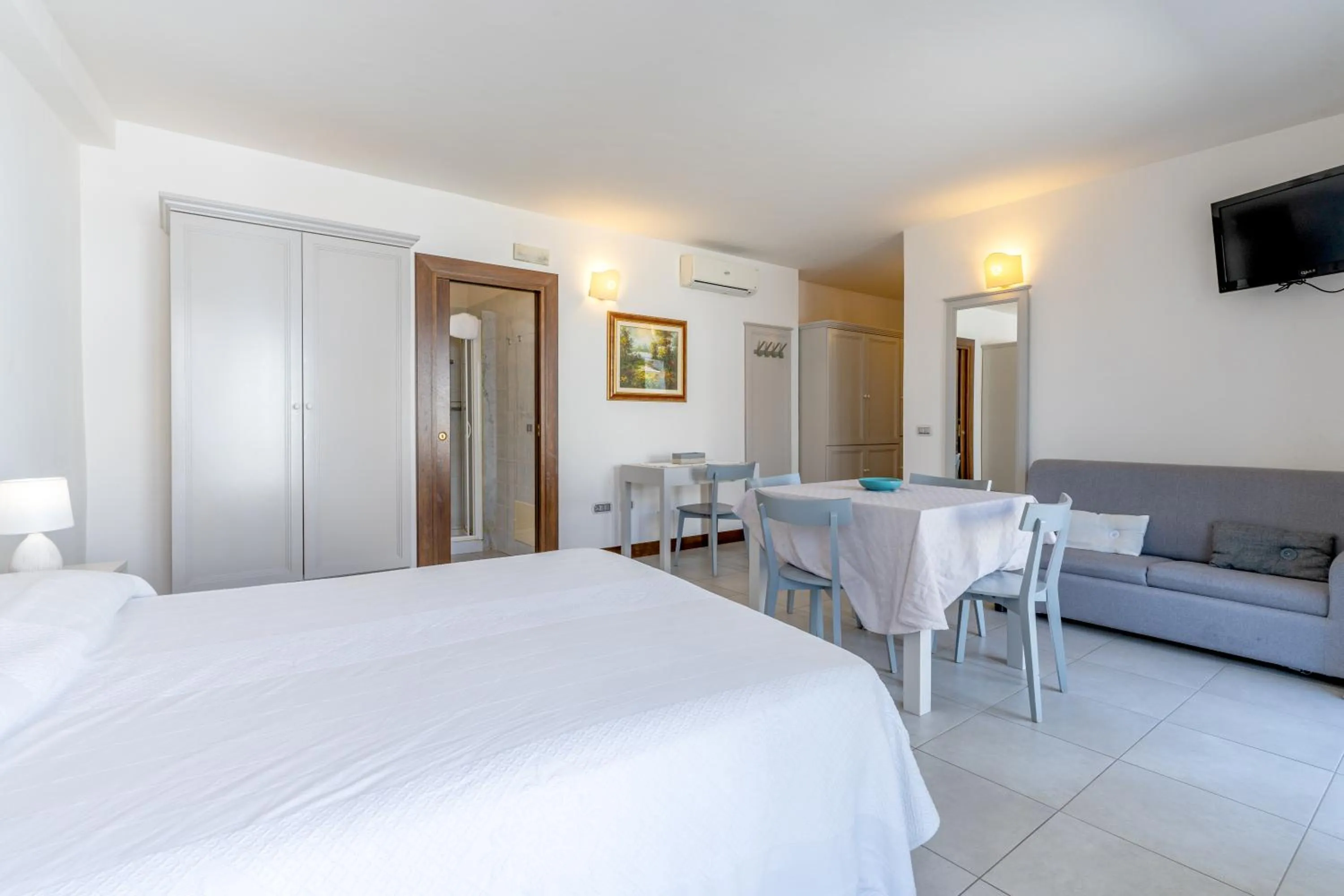 Living room, Bed in Albergo Residenziale La Corte