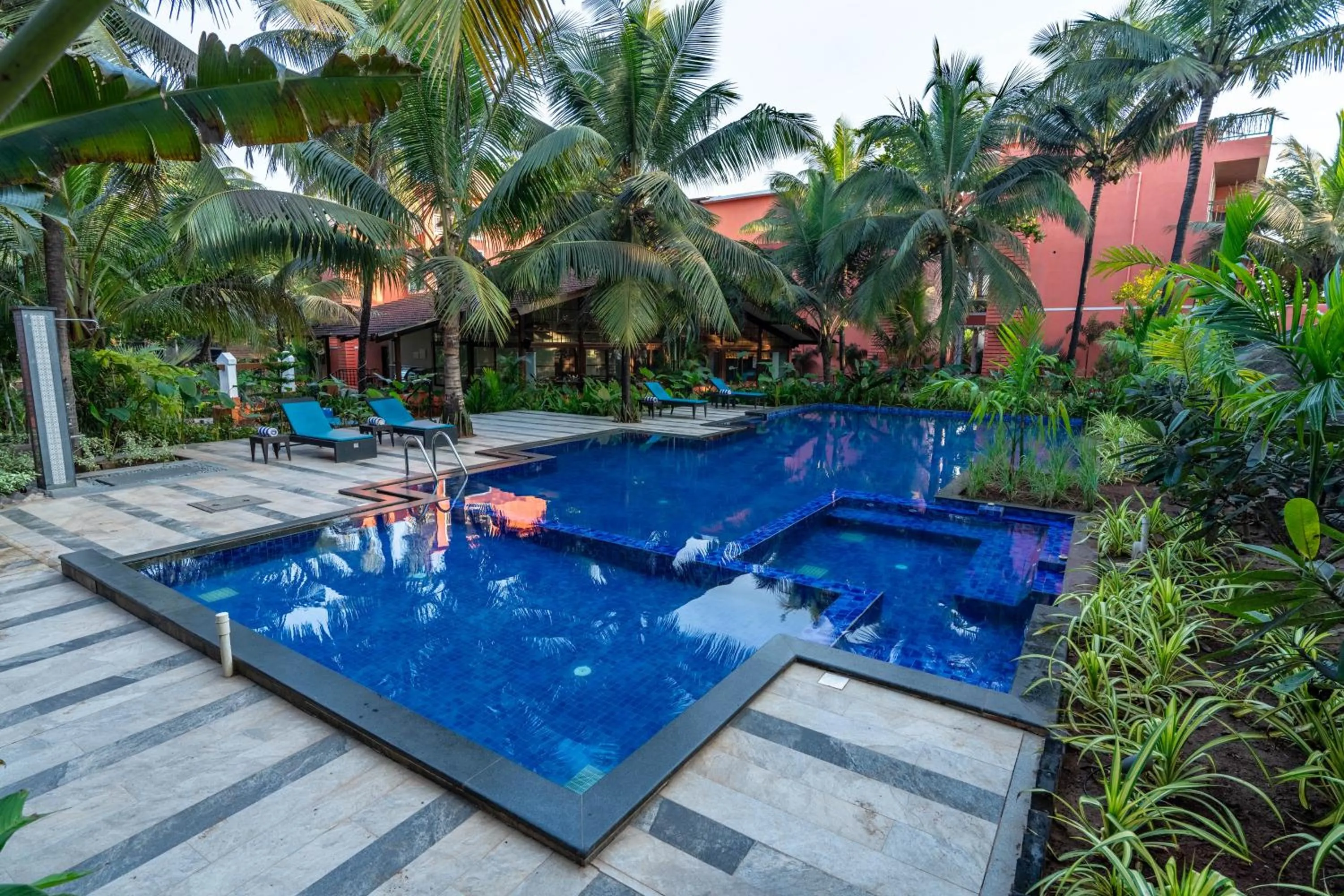 Swimming pool in Mandrem Beach Resort, a member of Radisson Individuals Retreat