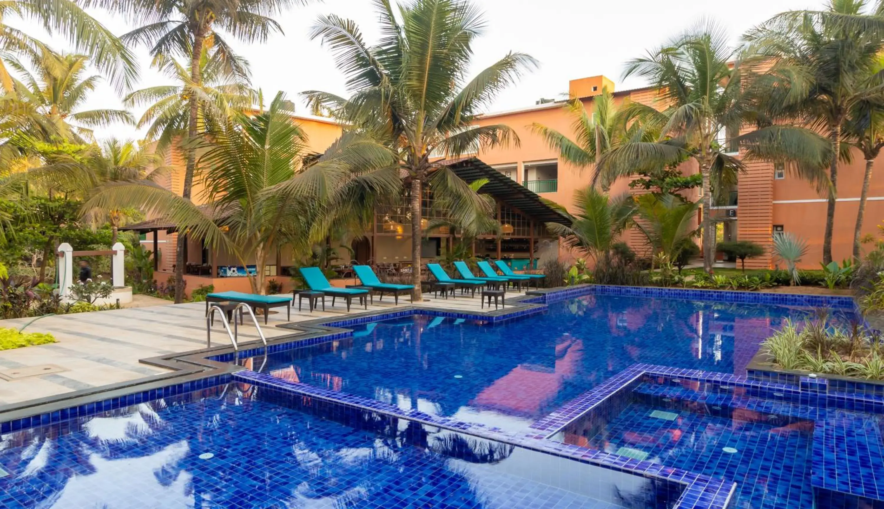 Pool view in Mandrem Beach Resort, a member of Radisson Individuals Retreat Pool view in Mandrem Beach Resort, a member of Radisson Individuals Retreat