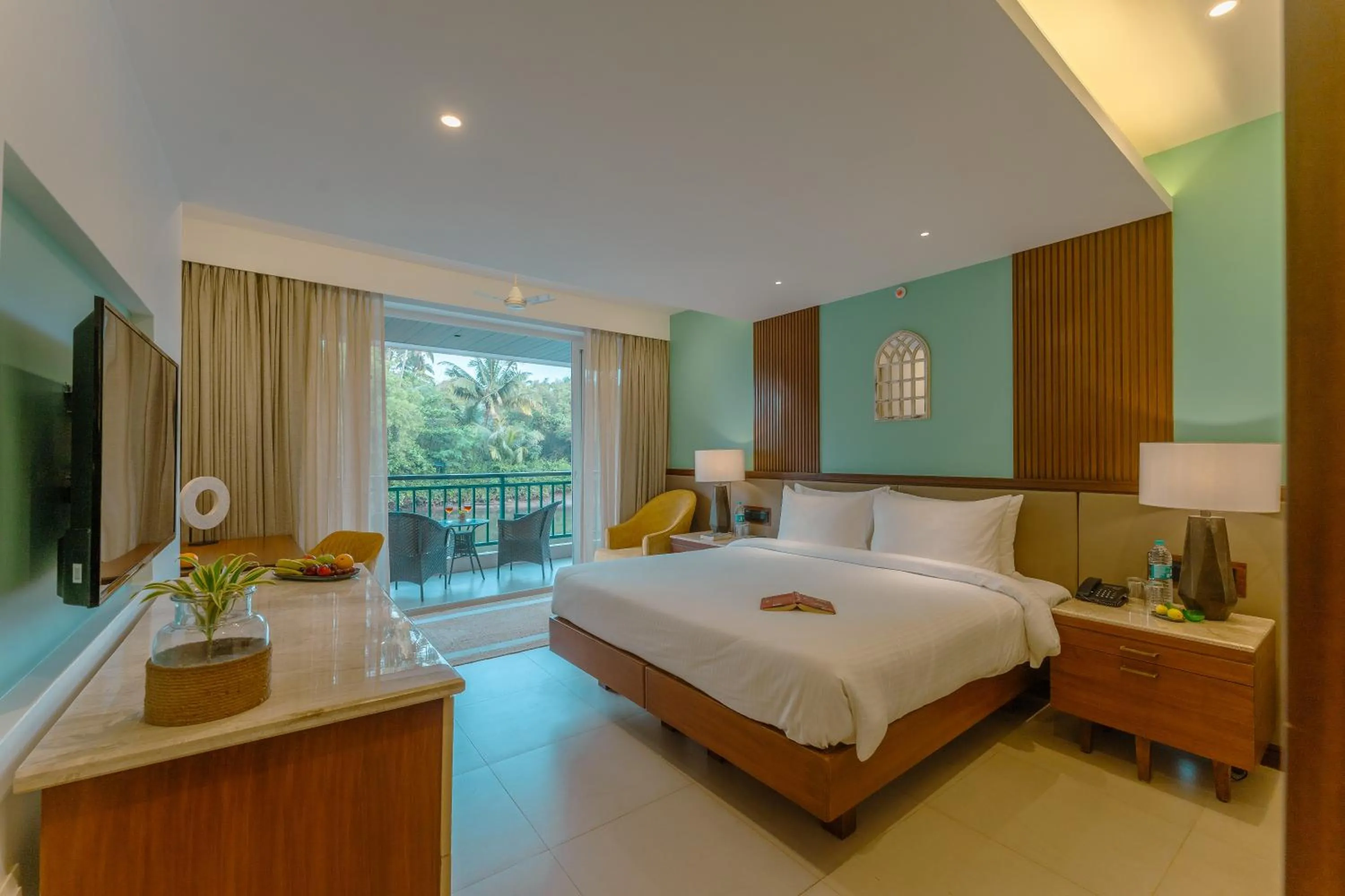 Bed in Mandrem Beach Resort, a member of Radisson Individuals Retreat