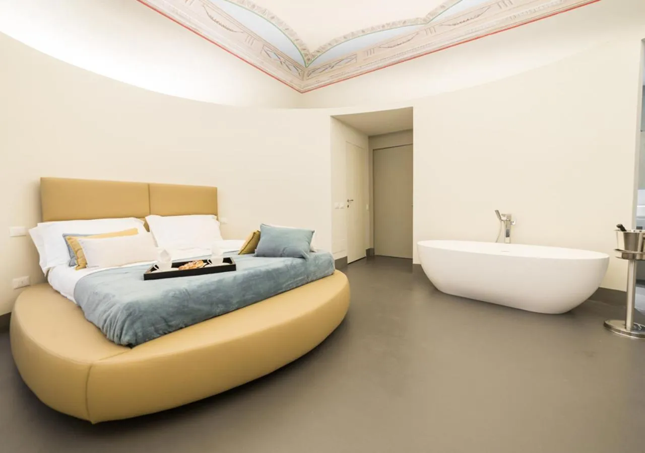 Bed in LUCUS Exclusive Bed and Breakfast