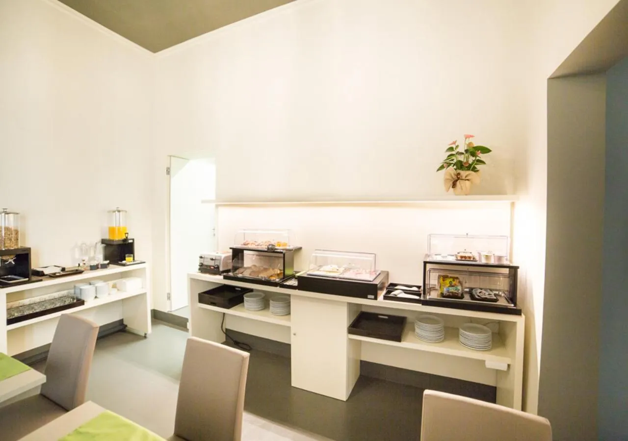 Communal lounge/ TV room in LUCUS Exclusive Bed and Breakfast