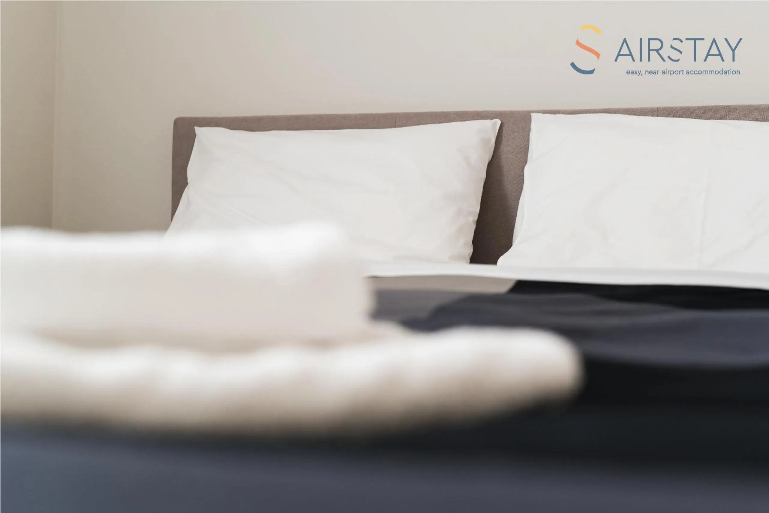 Bed in Elise Apartment Airport by Airstay