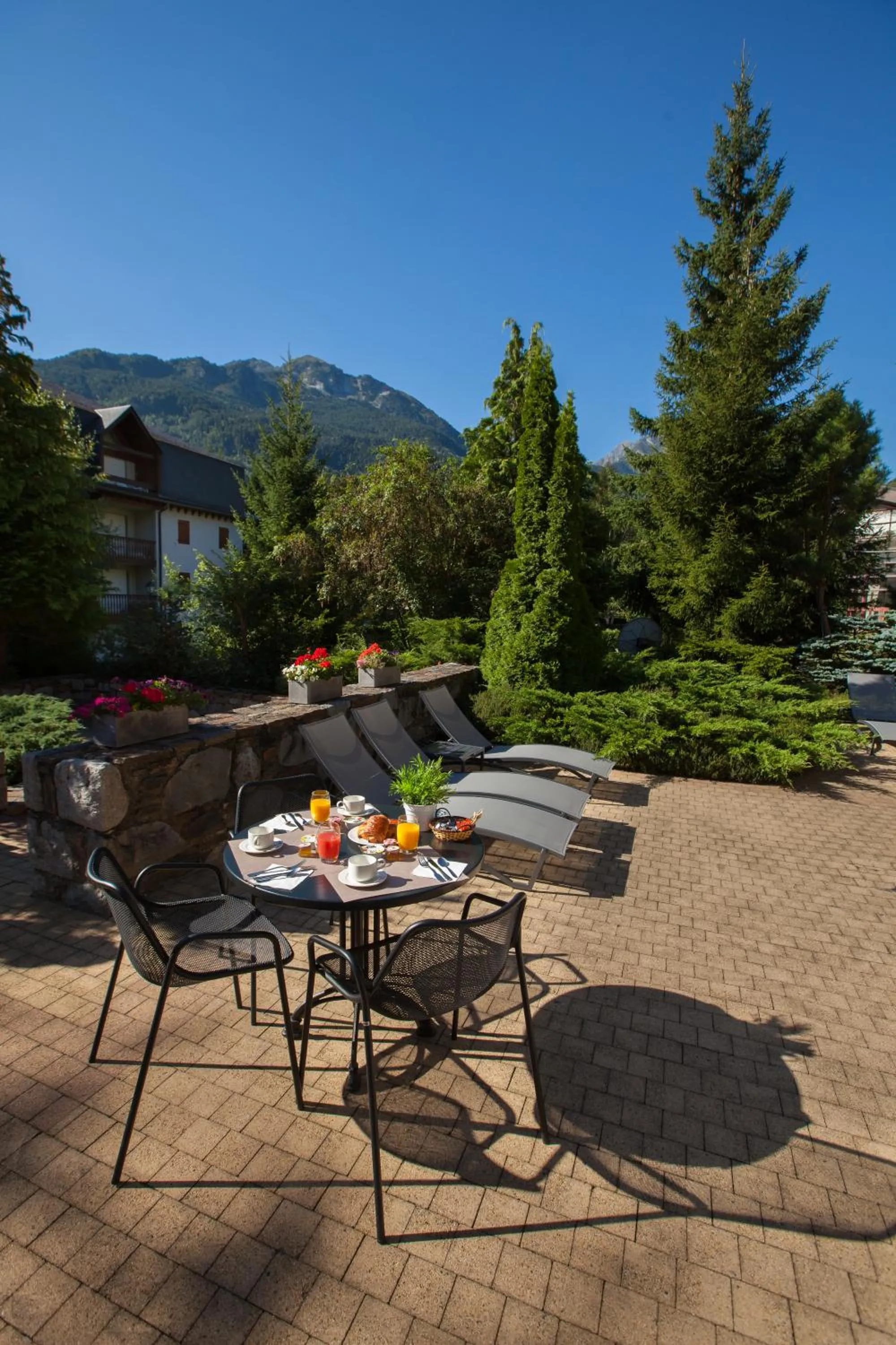 Patio in Mercure Saint-Lary