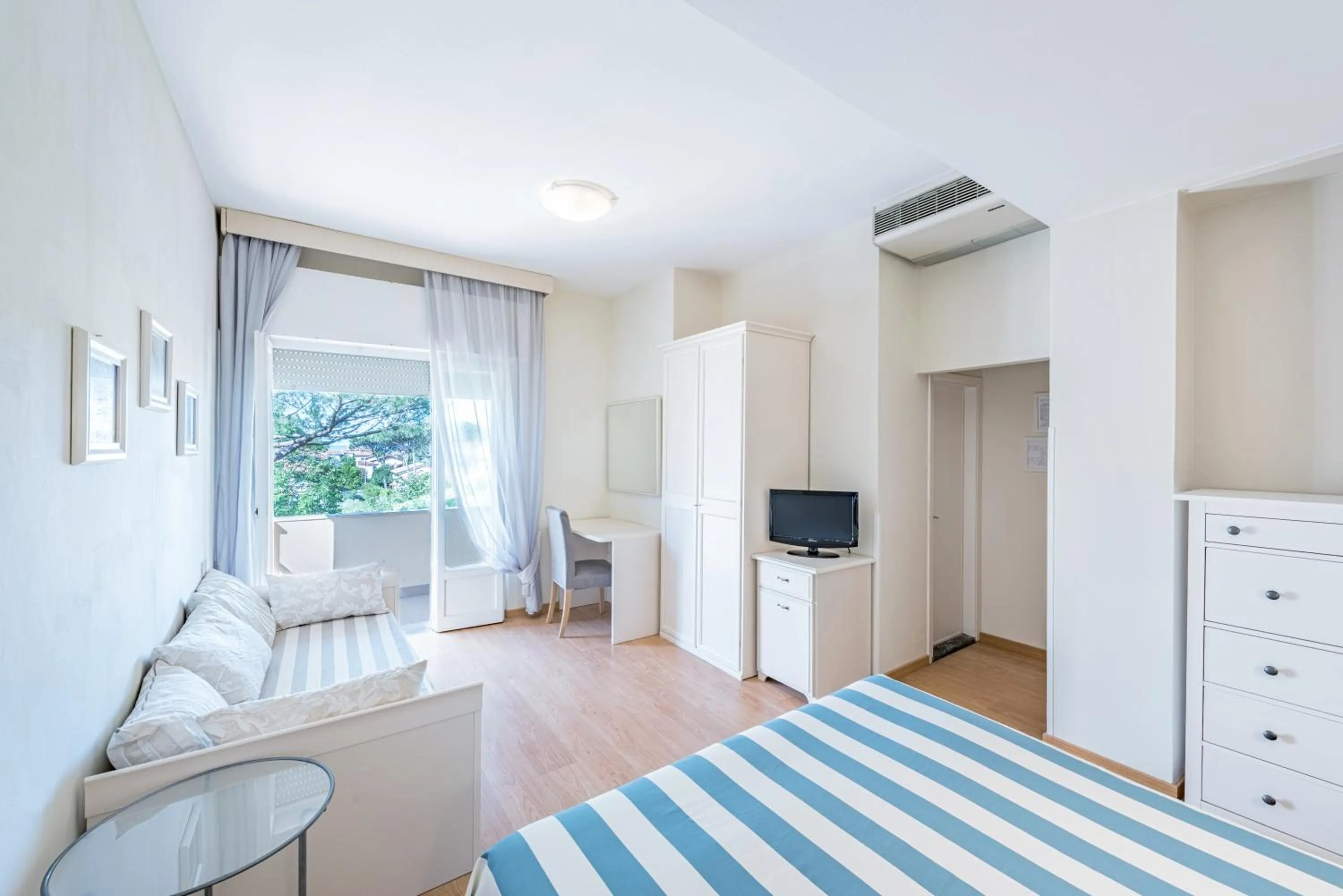 Bed in Hotel Andreaneri