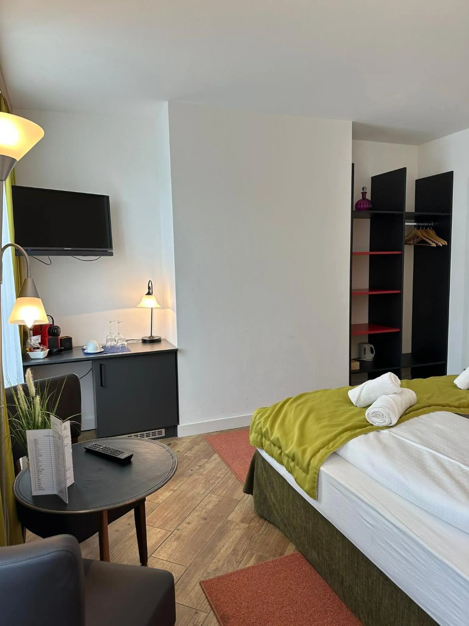 Bed in Versava Apartments