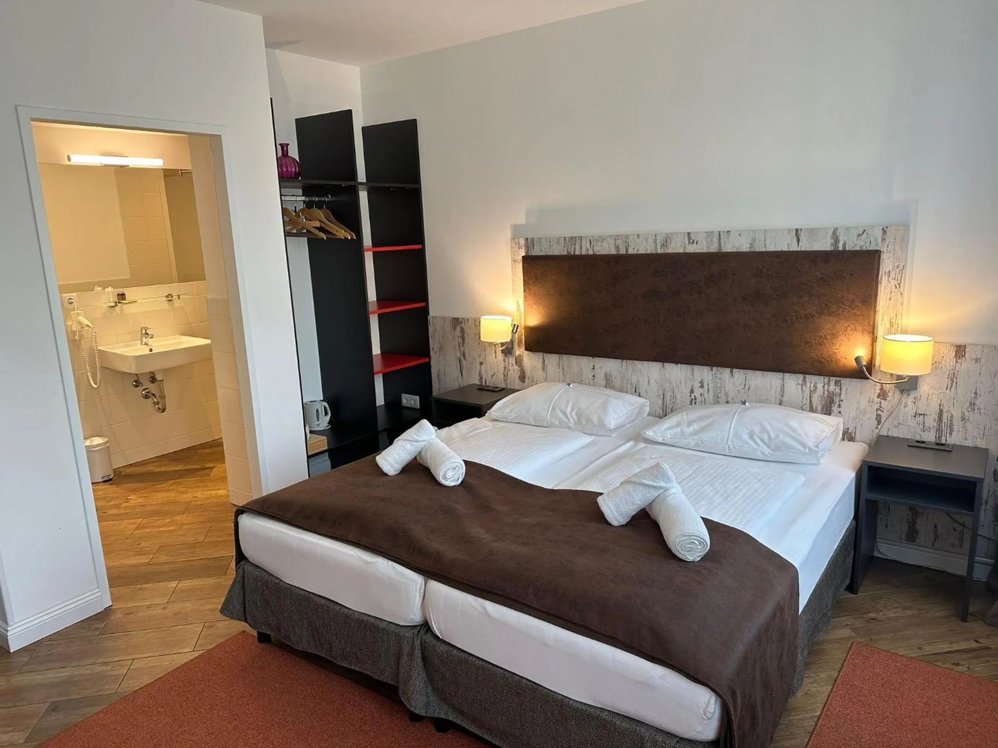 Bed in Versava Apartments