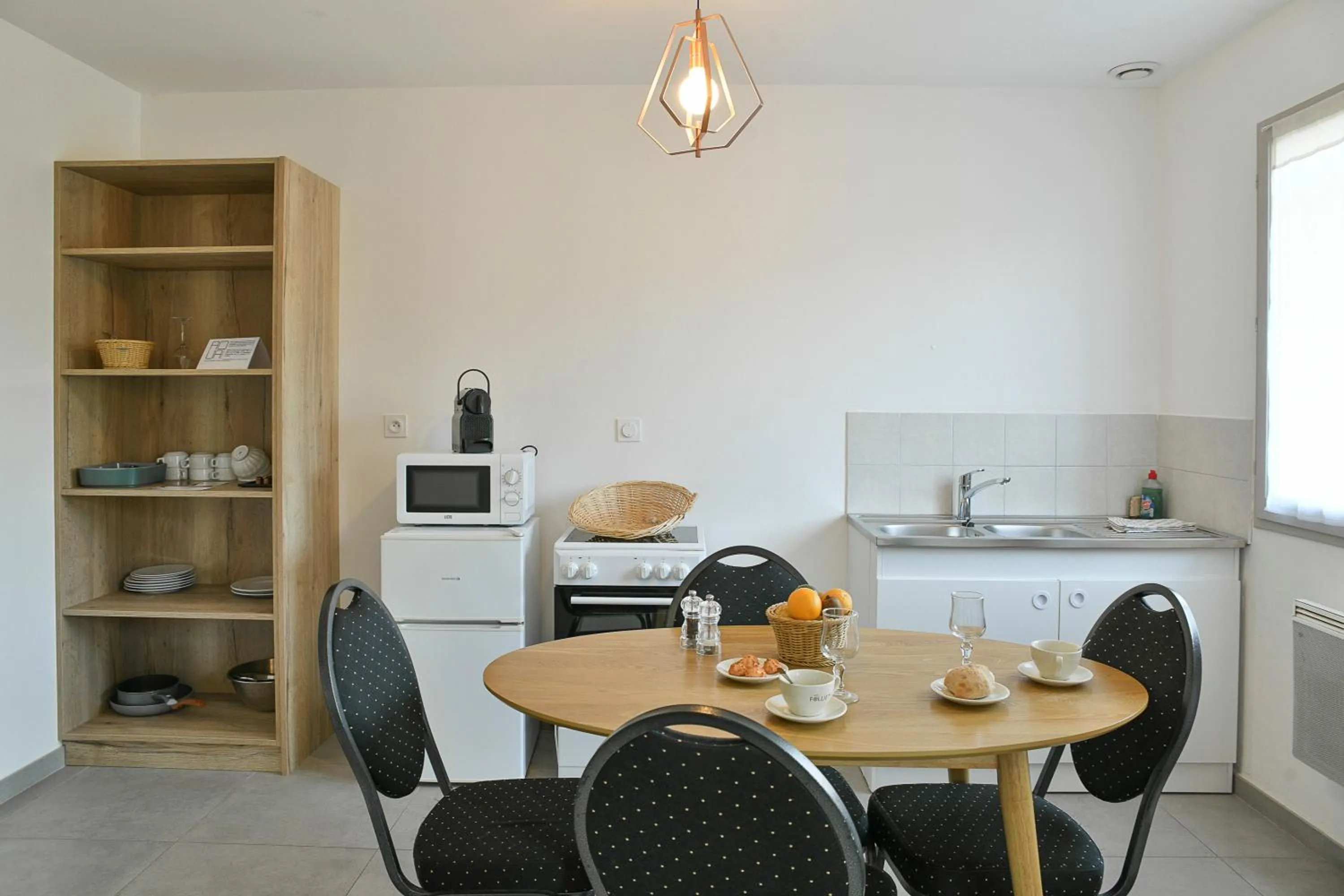 Kitchen or kitchenette in Les Villas du Domaine de Suzel