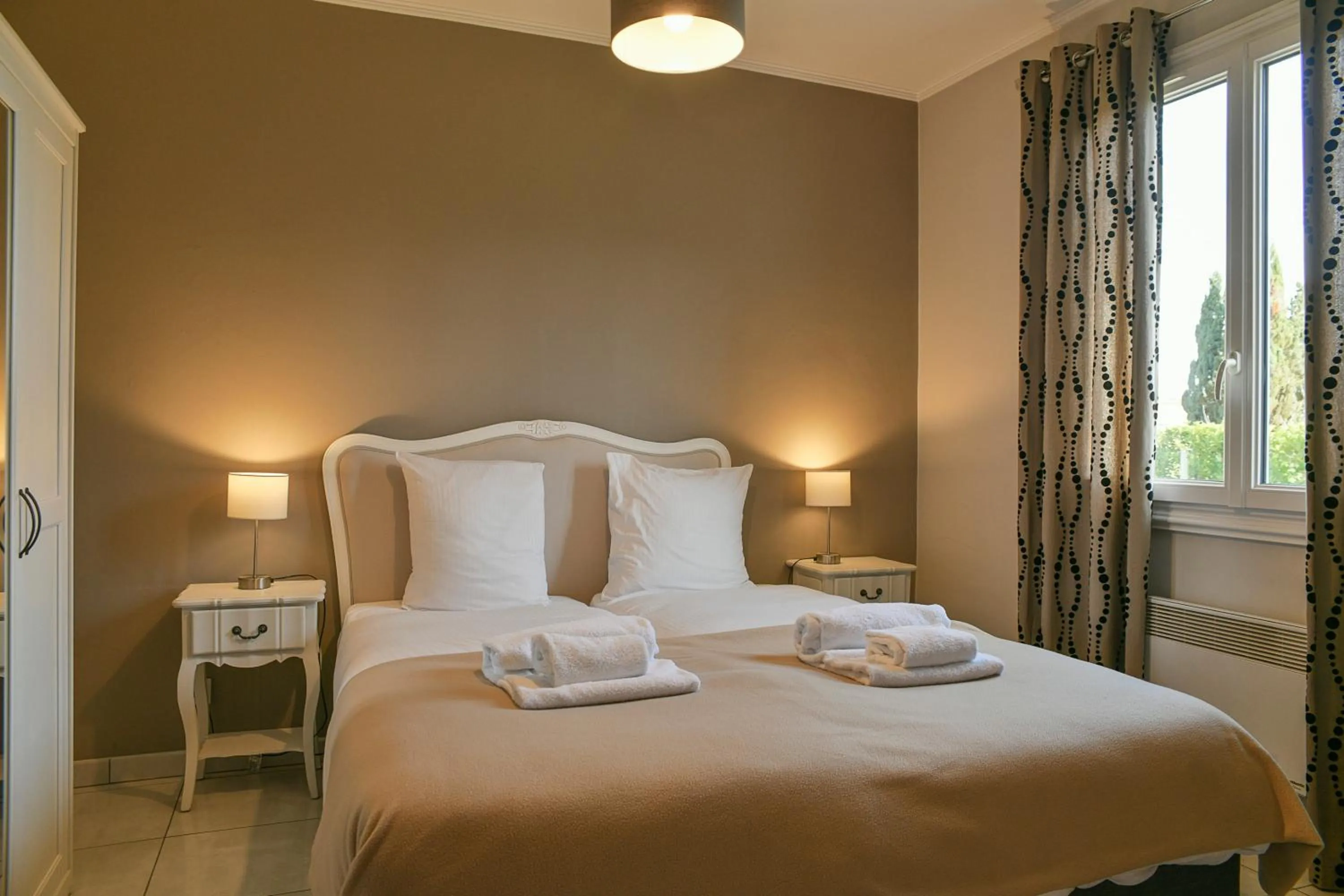 Bed in Les Villas du Domaine de Suzel