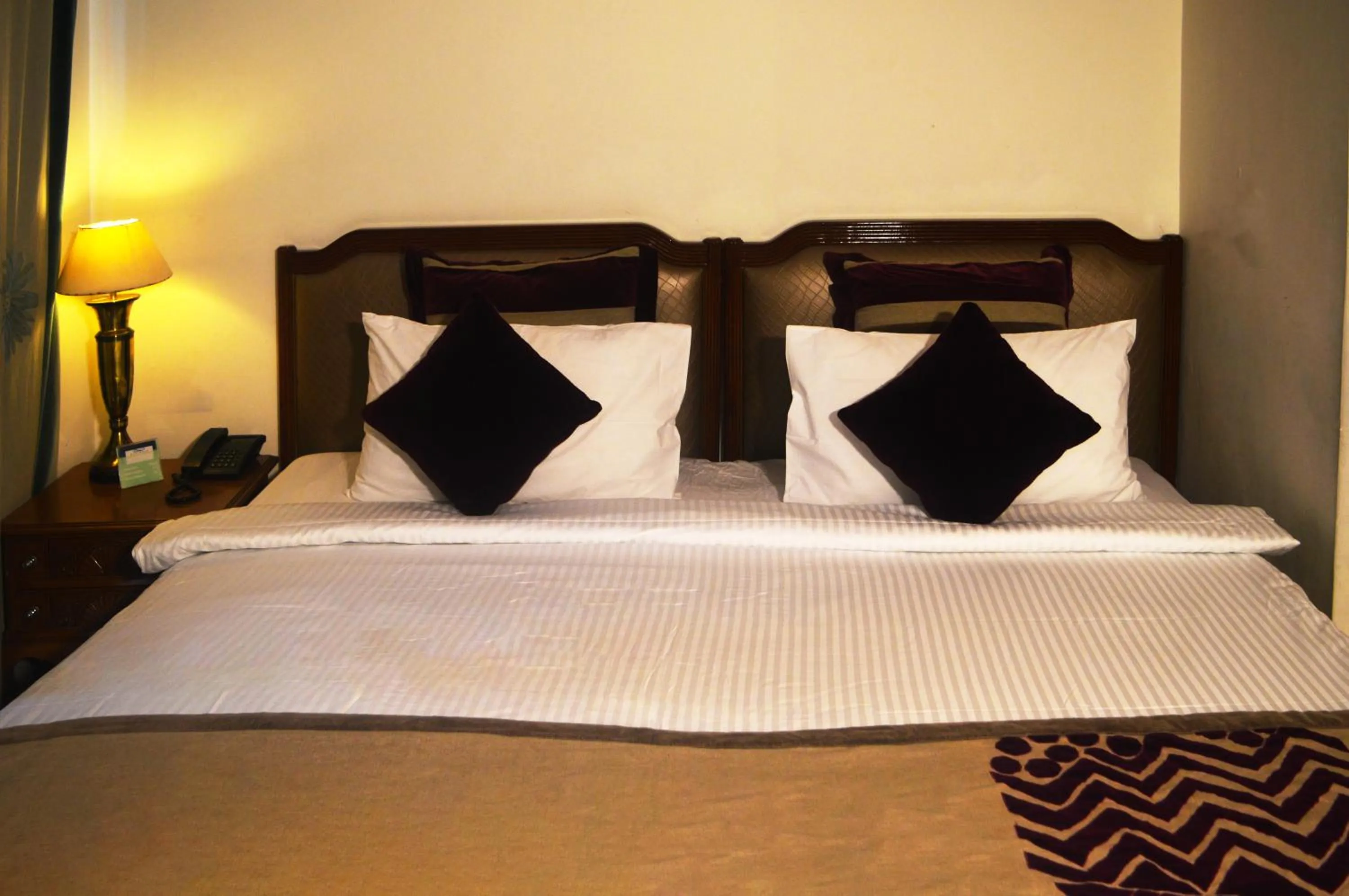 Bed in Marigold Sarovar Portico Shimla