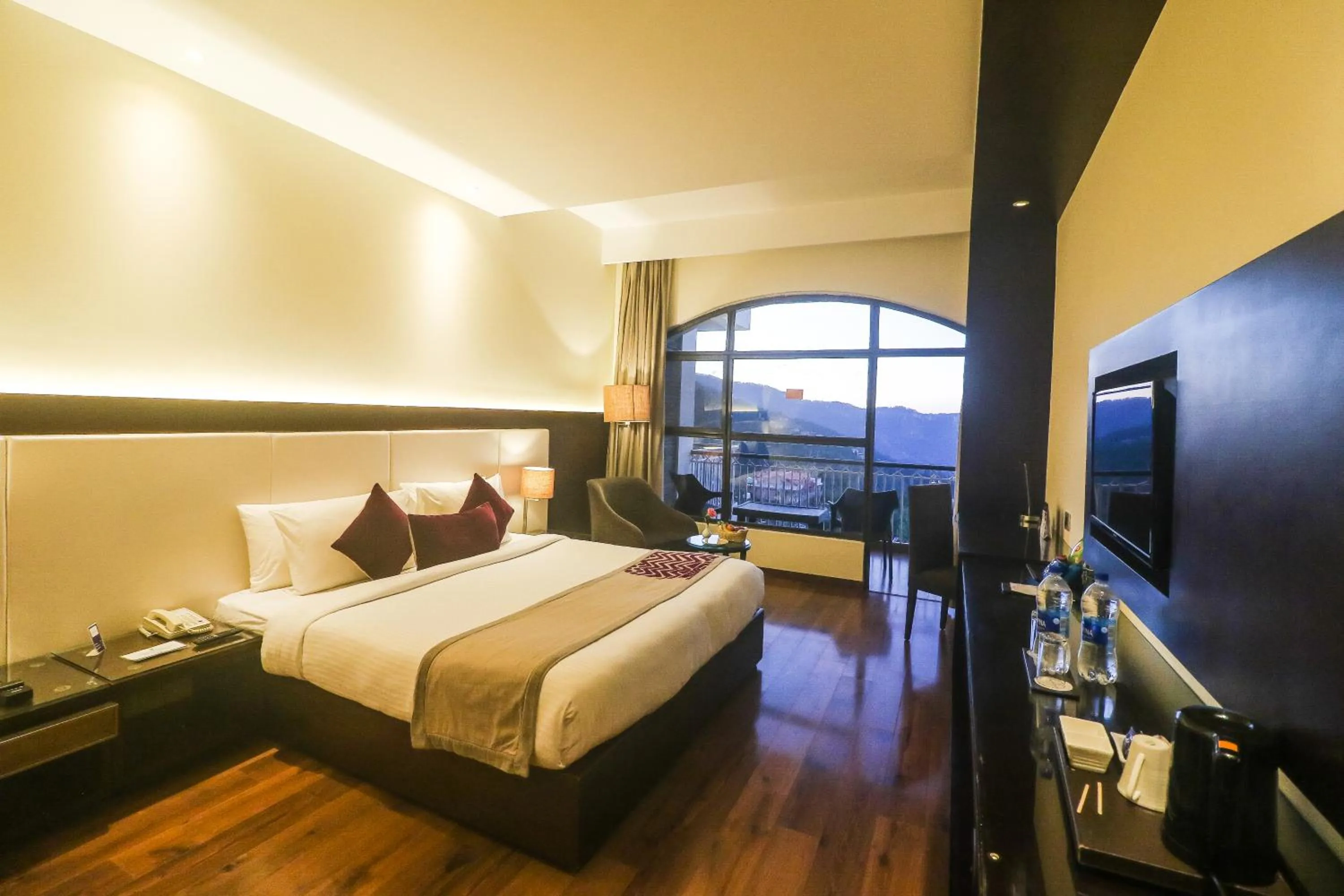 Photo of the whole room, Bed in Marigold Sarovar Portico Shimla