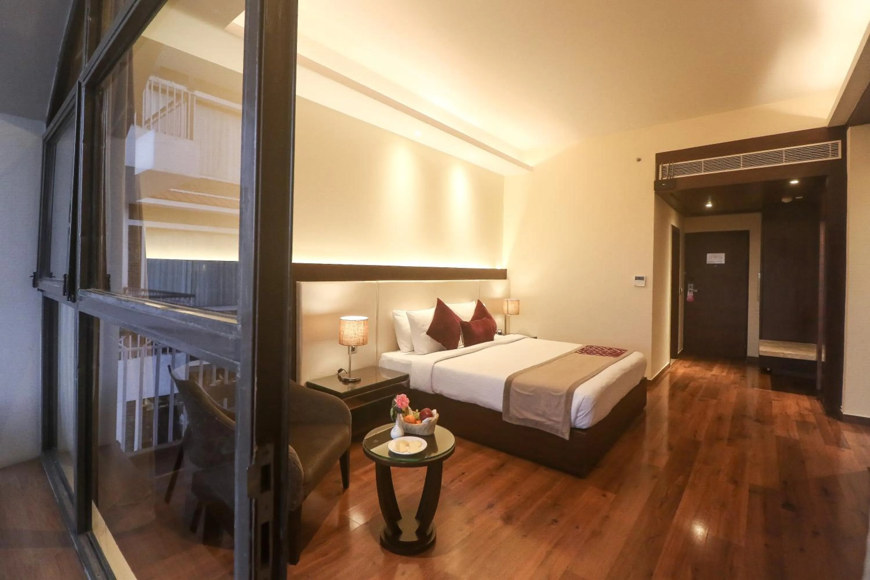 Photo of the whole room, Bed in Marigold Sarovar Portico Shimla