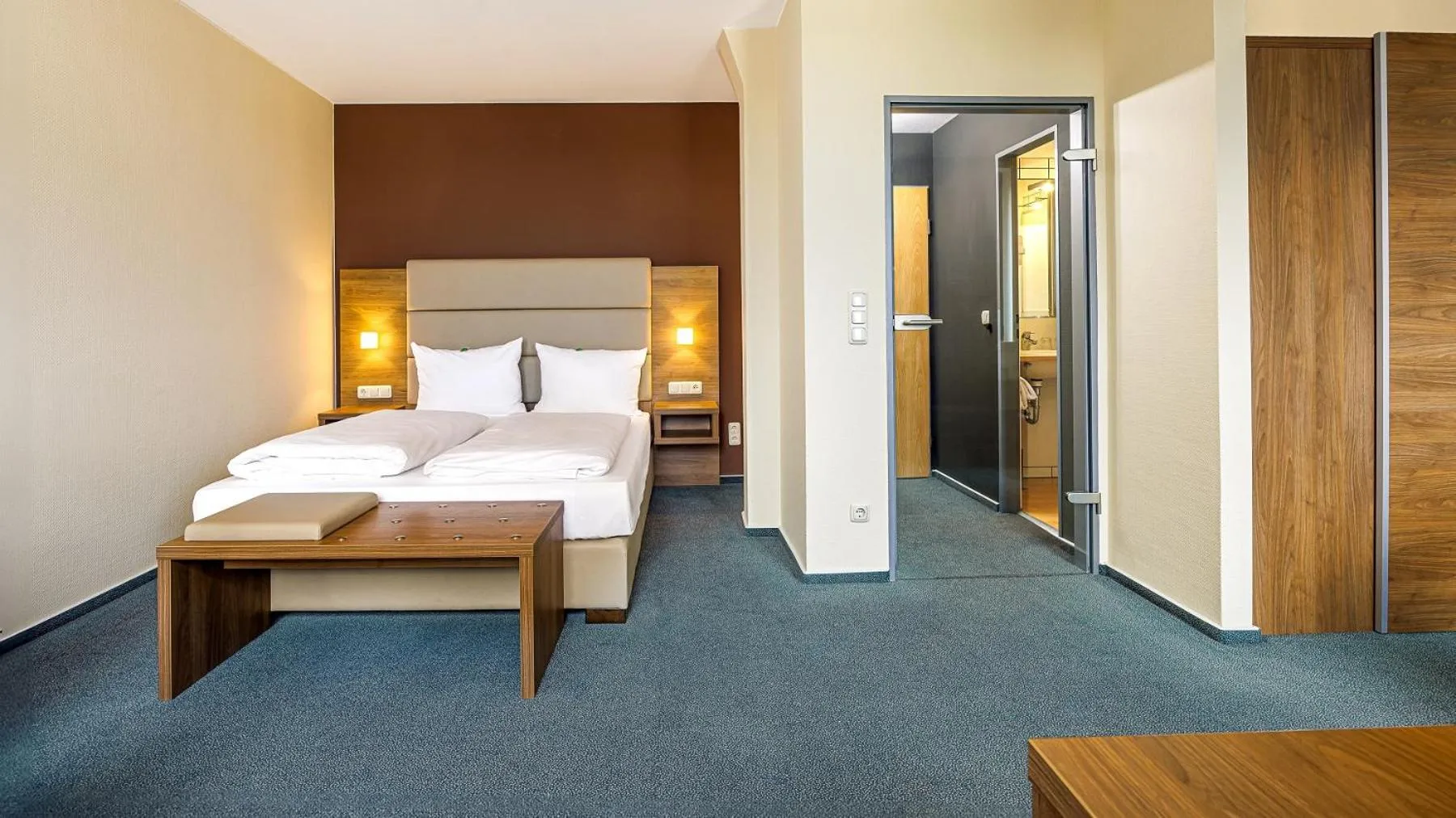 Photo of the whole room, Bed in GenoHotel Forsbach