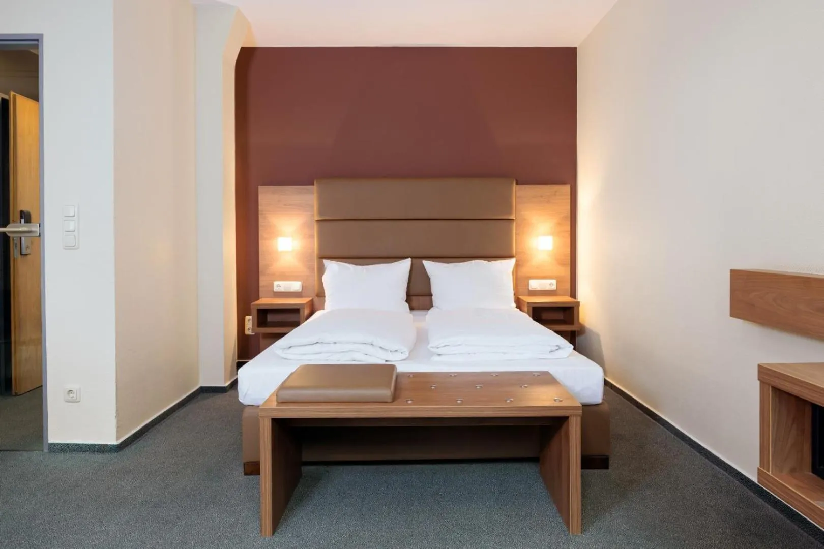 Photo of the whole room, Bed in GenoHotel Forsbach