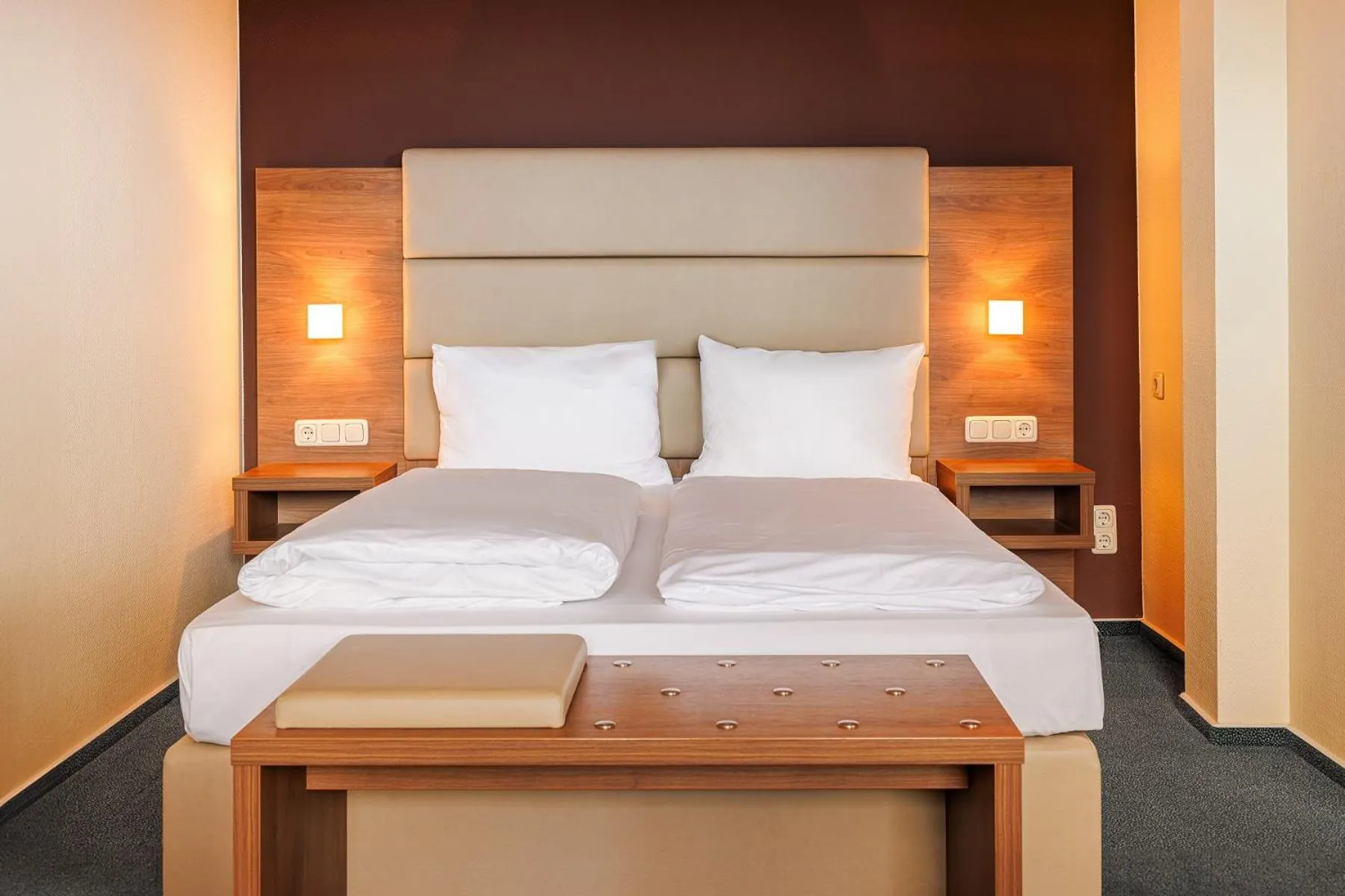 Photo of the whole room, Bed in GenoHotel Forsbach