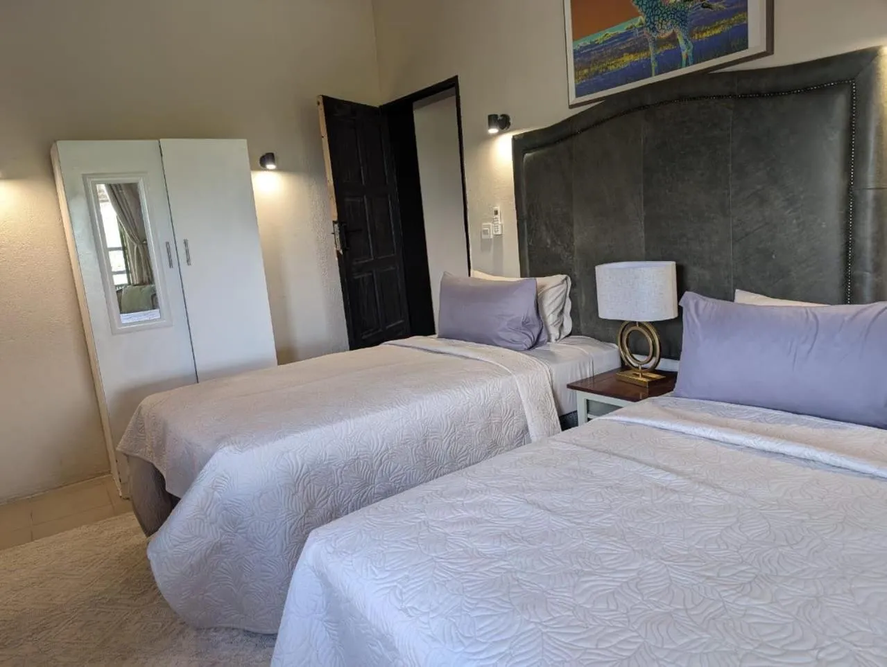 Bed in Sunbirds Lodge Chobe