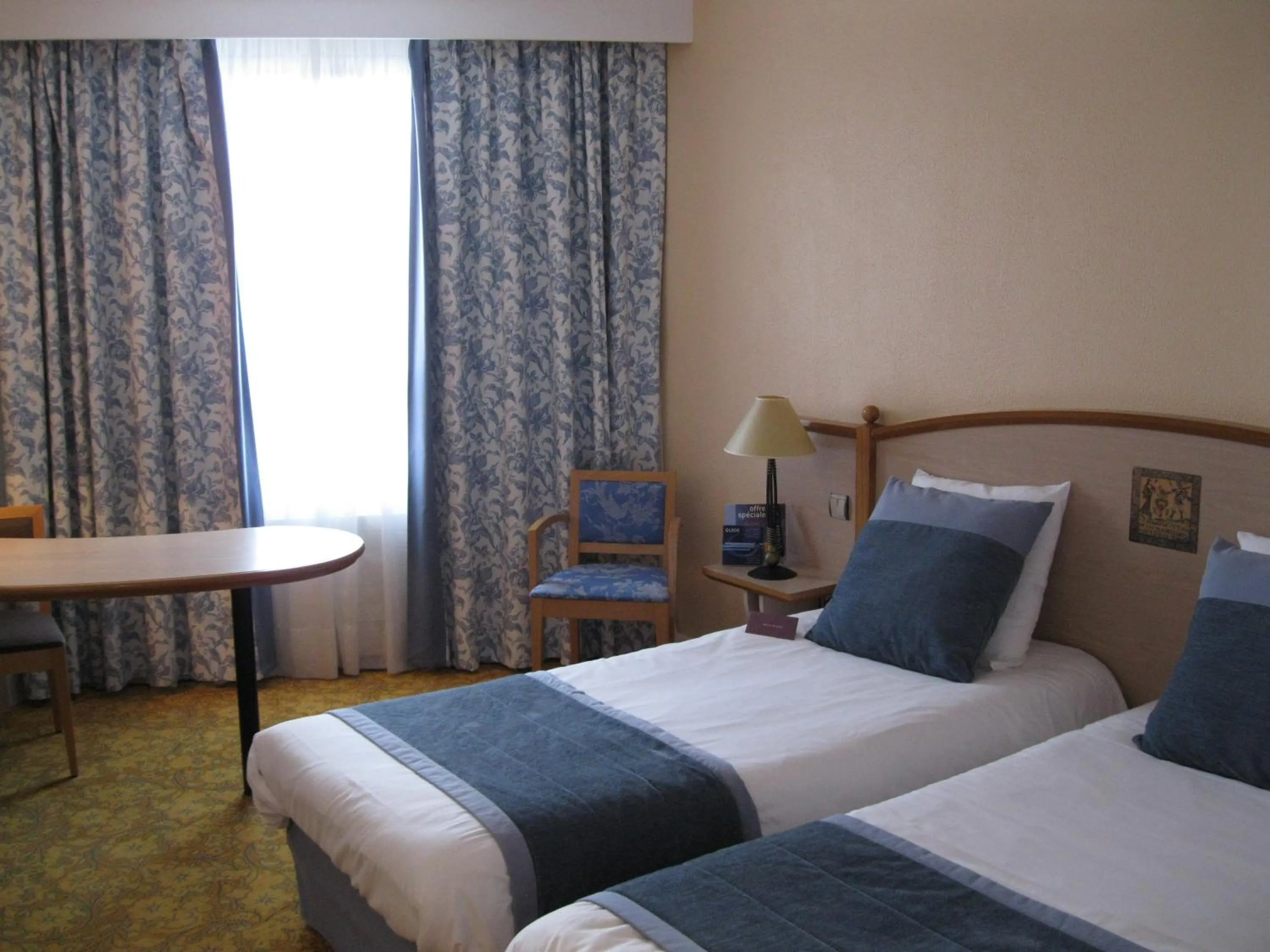 Bed in Mercure Nevers Pont De Loire