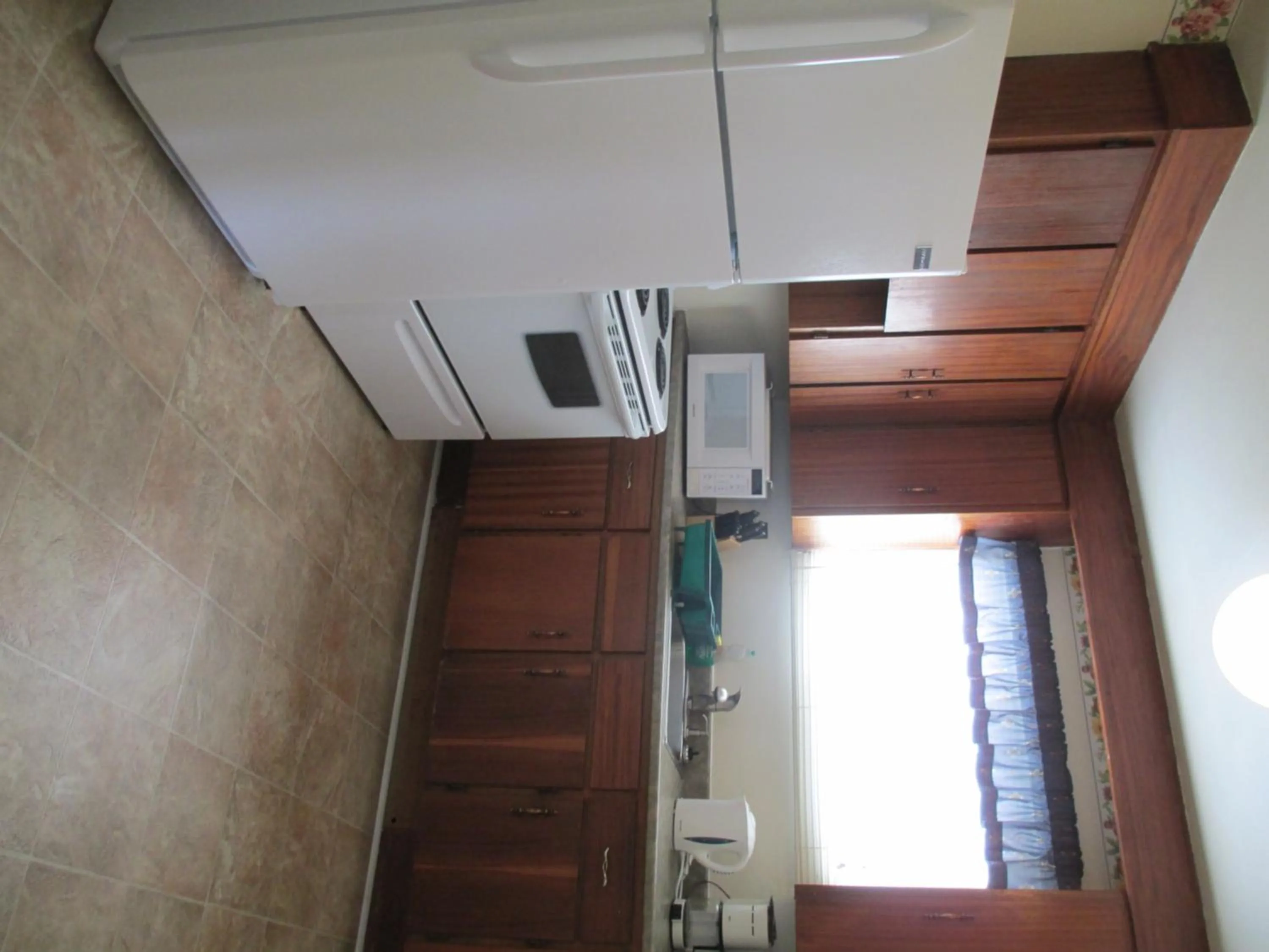 Kitchen or kitchenette in Comerford's Ocean View Suites