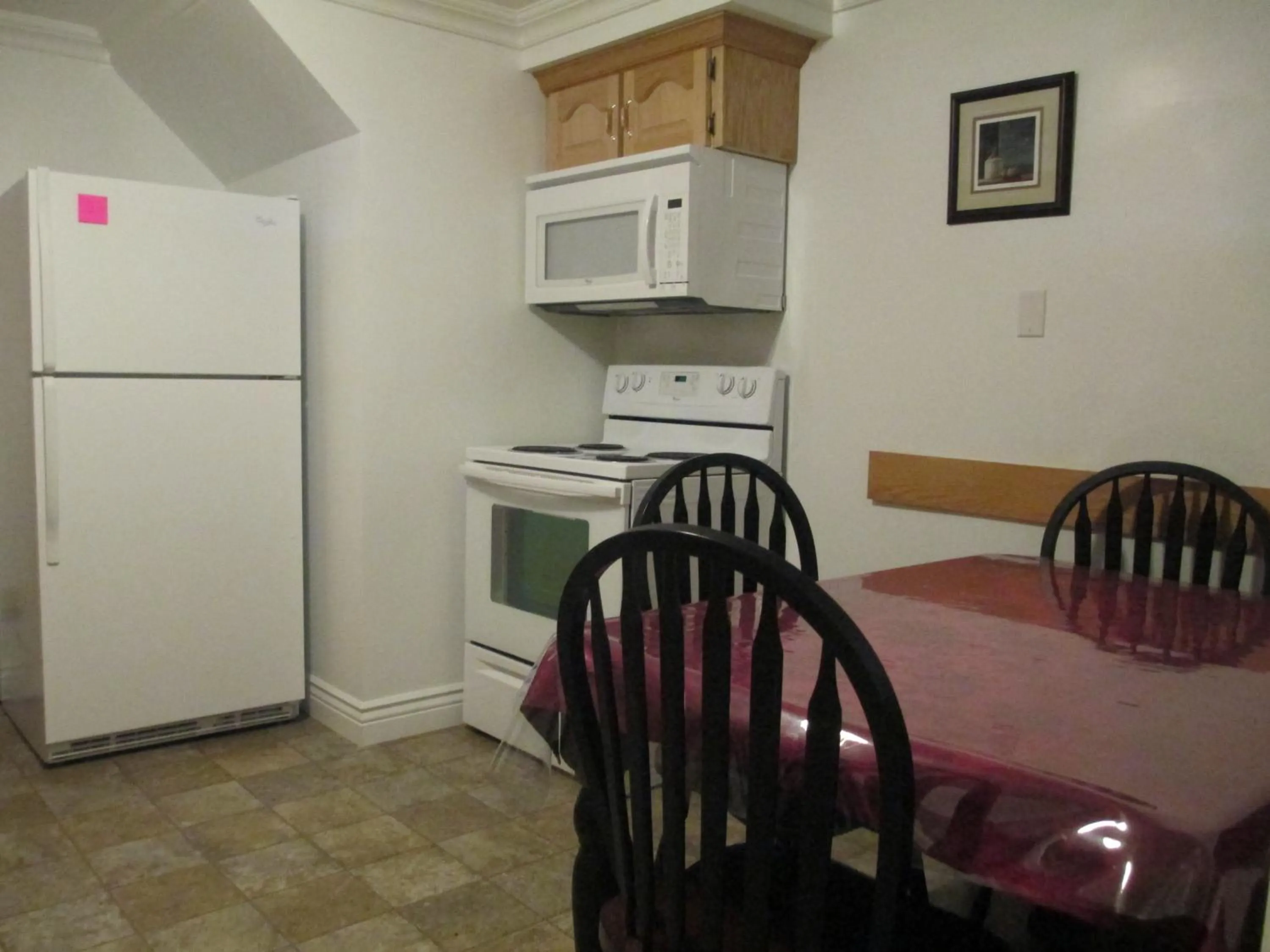 Kitchen or kitchenette in Comerford's Ocean View Suites