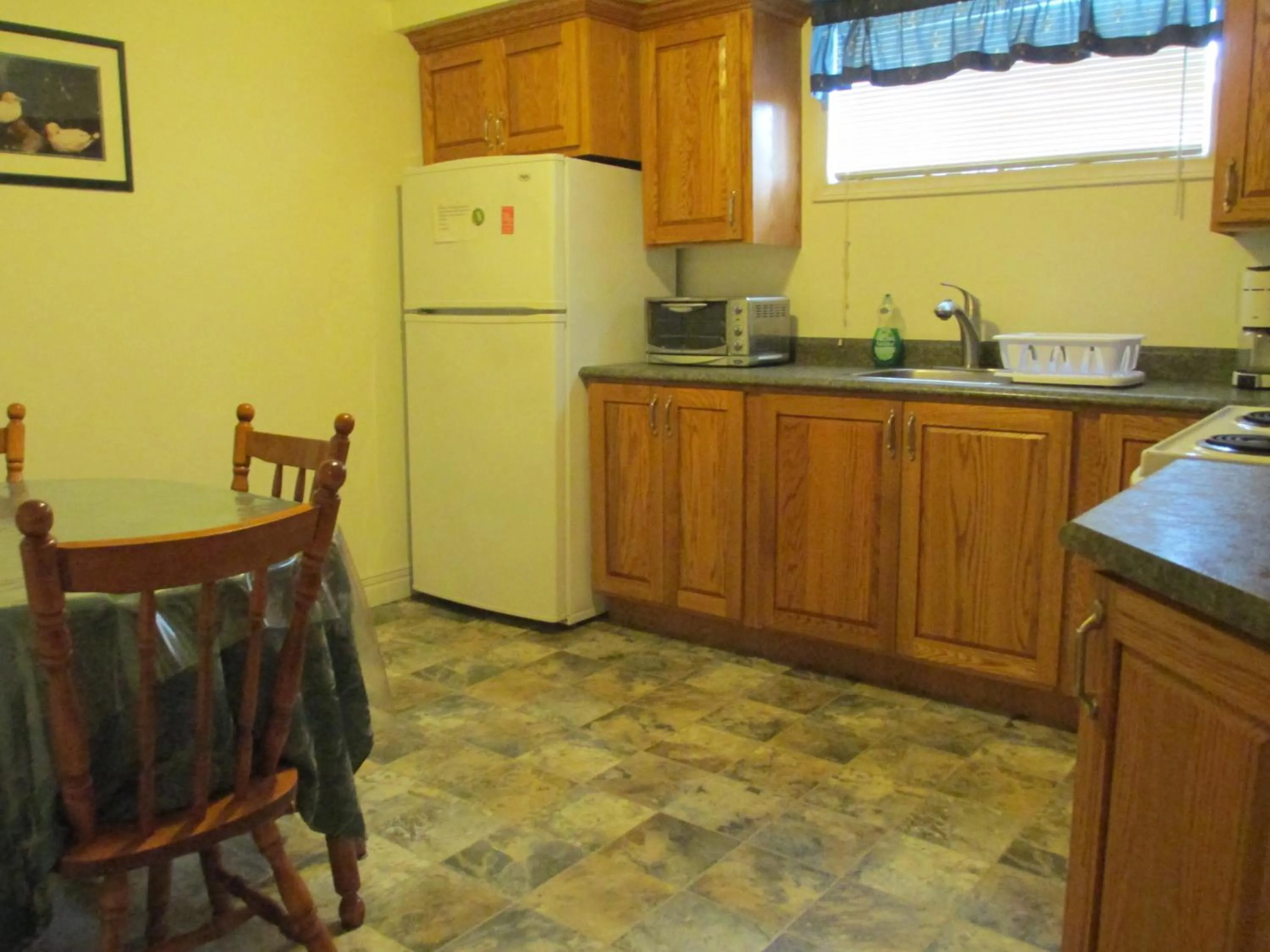 Kitchen or kitchenette in Comerford's Ocean View Suites