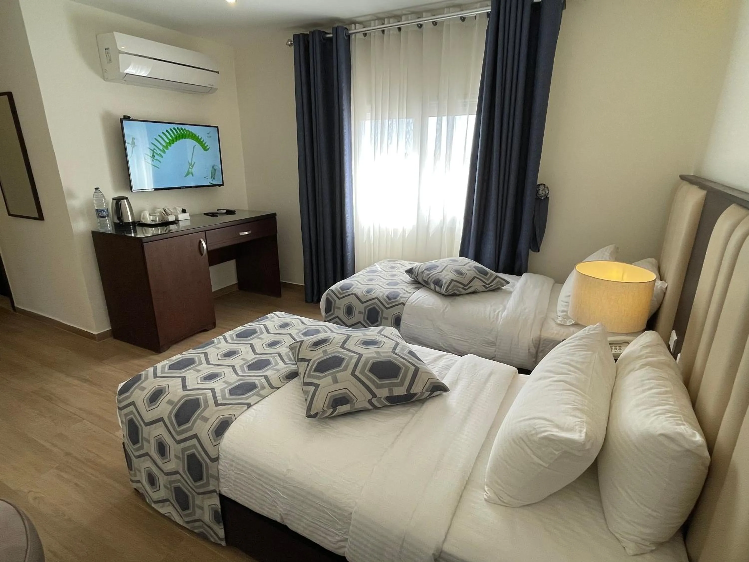 TV and multimedia, Bed in Petra Heart Hotel