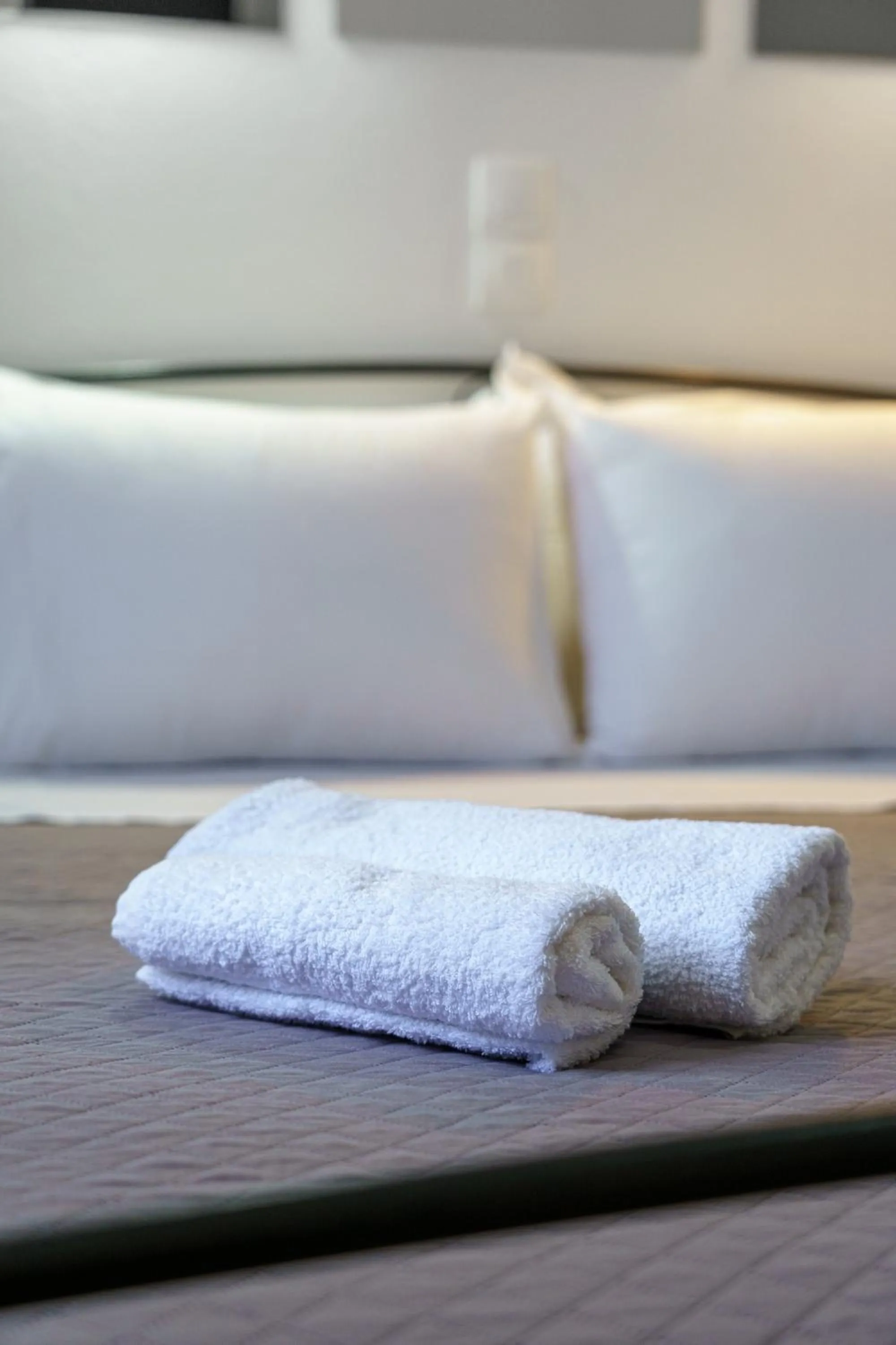 Bed in Marousi Rooms