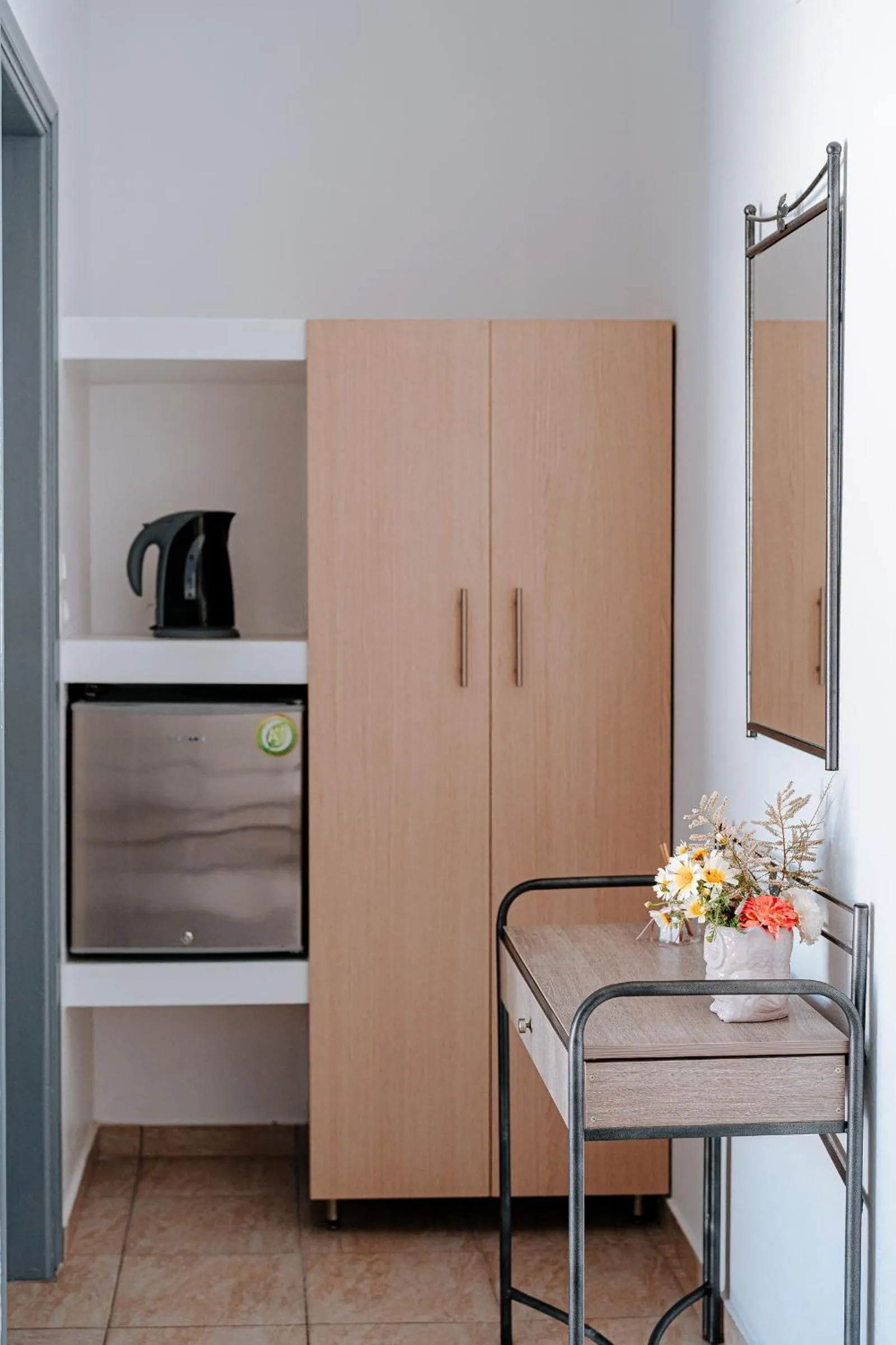 Bed in Marousi Rooms