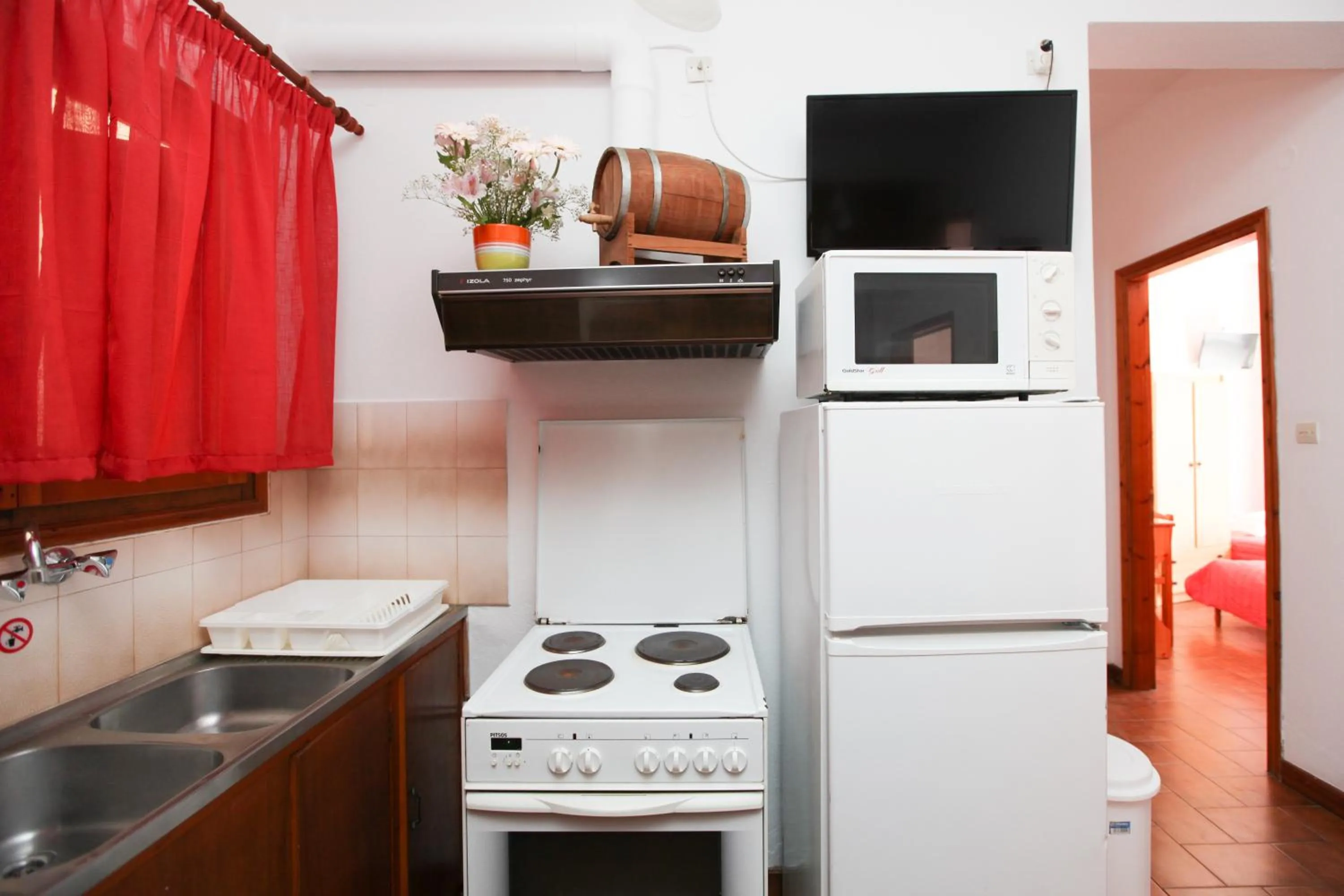 Kitchen or kitchenette in Skiathos House