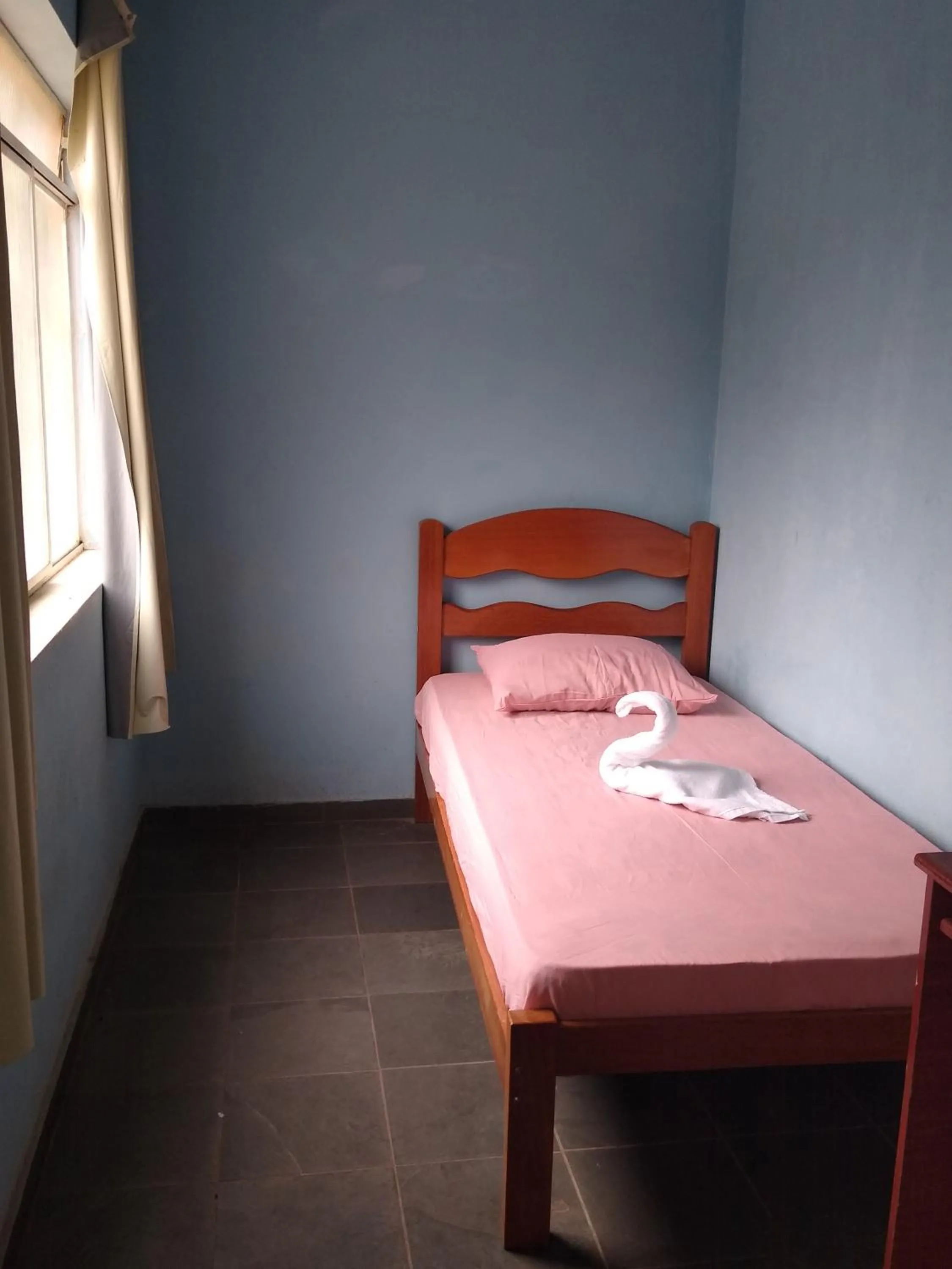 Bed in POUSADA DO JOAO