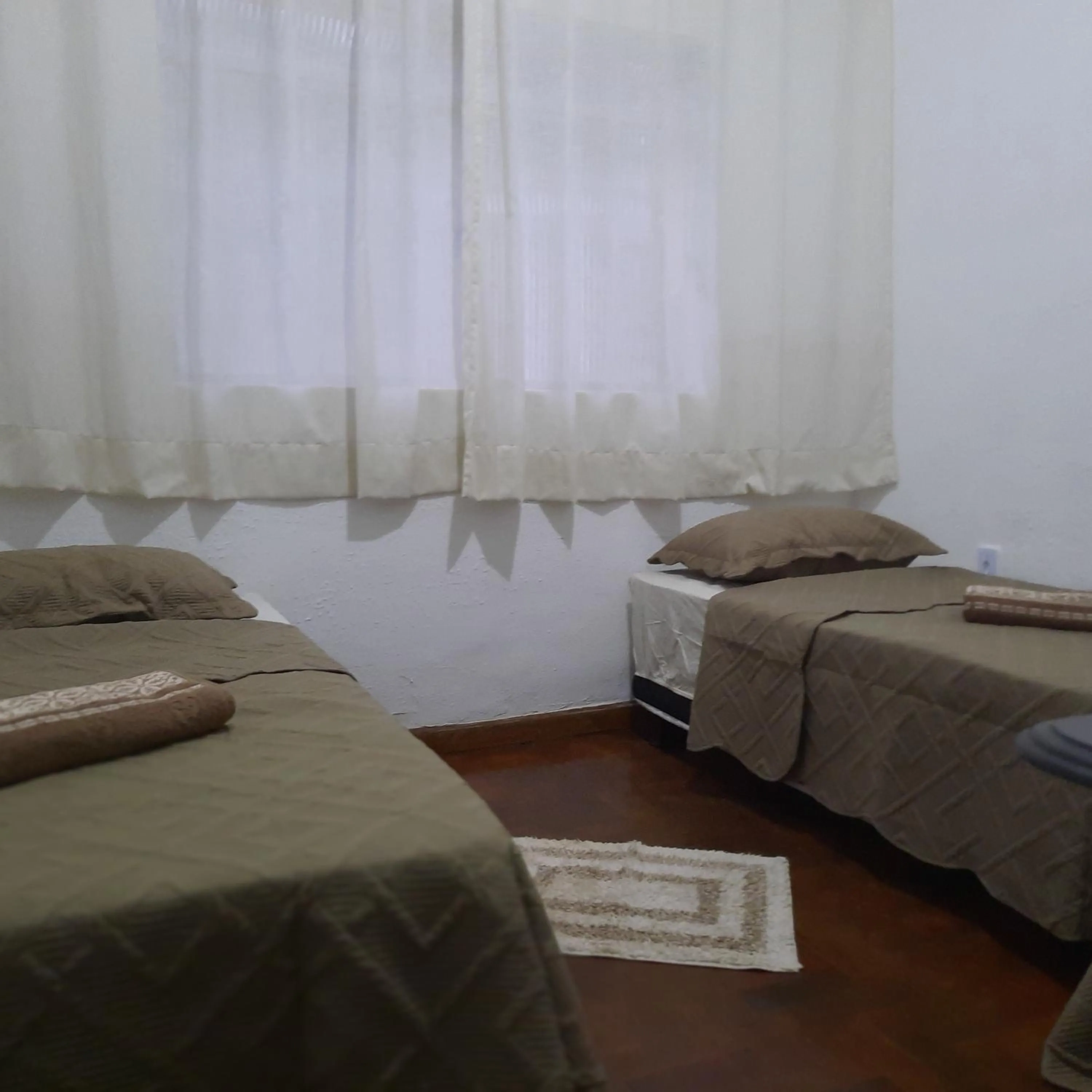Bed in POUSADA DO JOAO