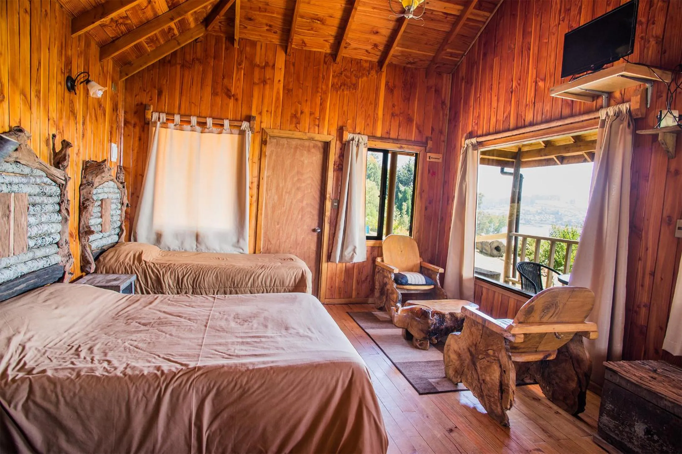 Seating area, Bed in Apart hotel Puchaley Lafquen