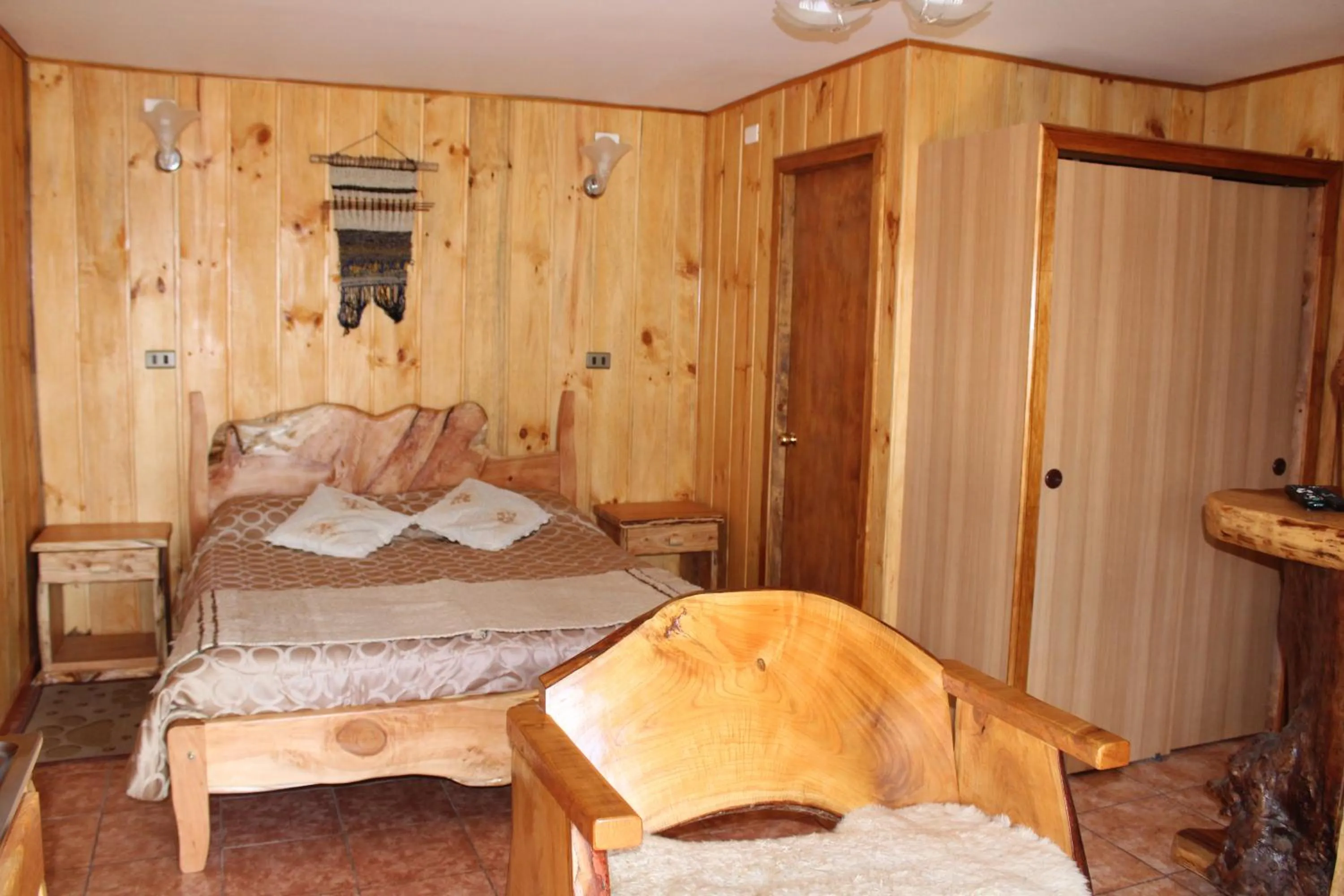 Bed in Apart hotel Puchaley Lafquen