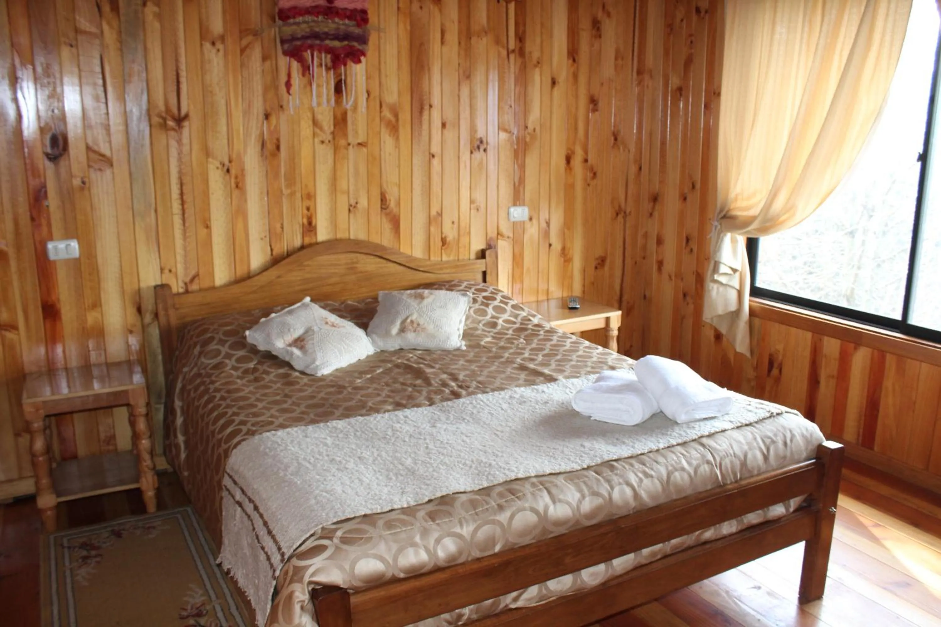 Bed in Apart hotel Puchaley Lafquen