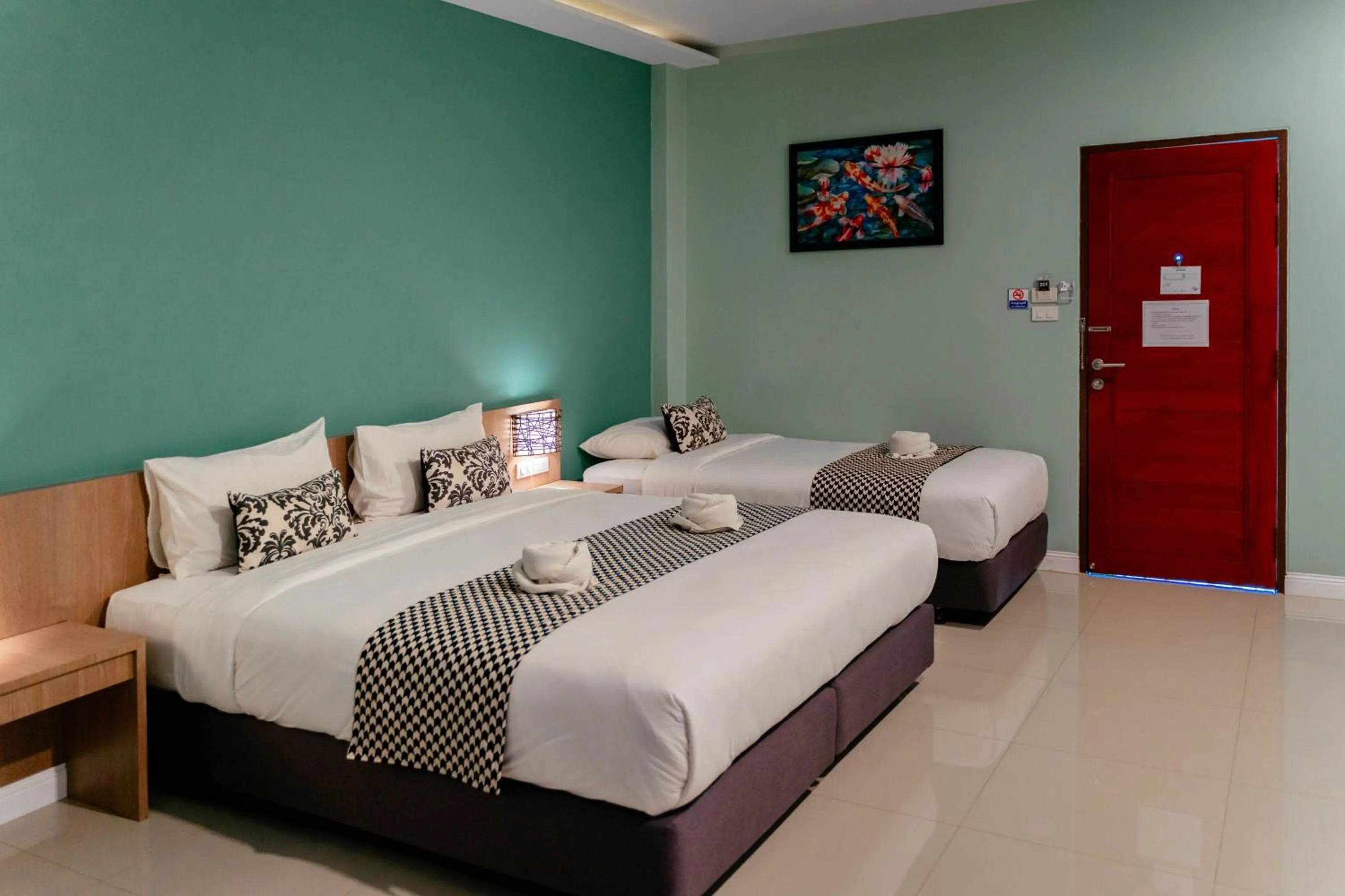 Photo of the whole room, Bed in It's me Keawanong Hotel