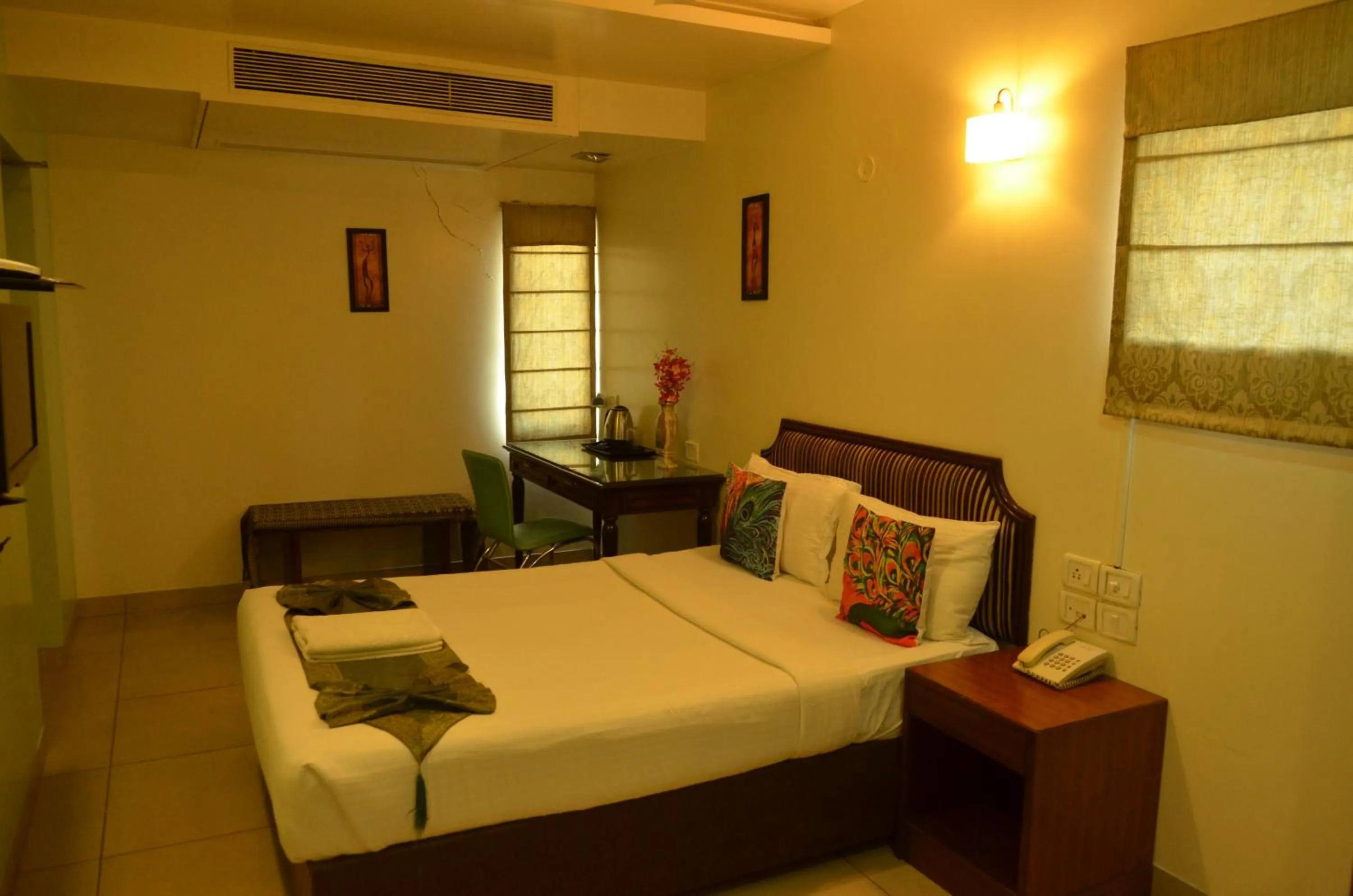 Bed in Cubbon Suites
