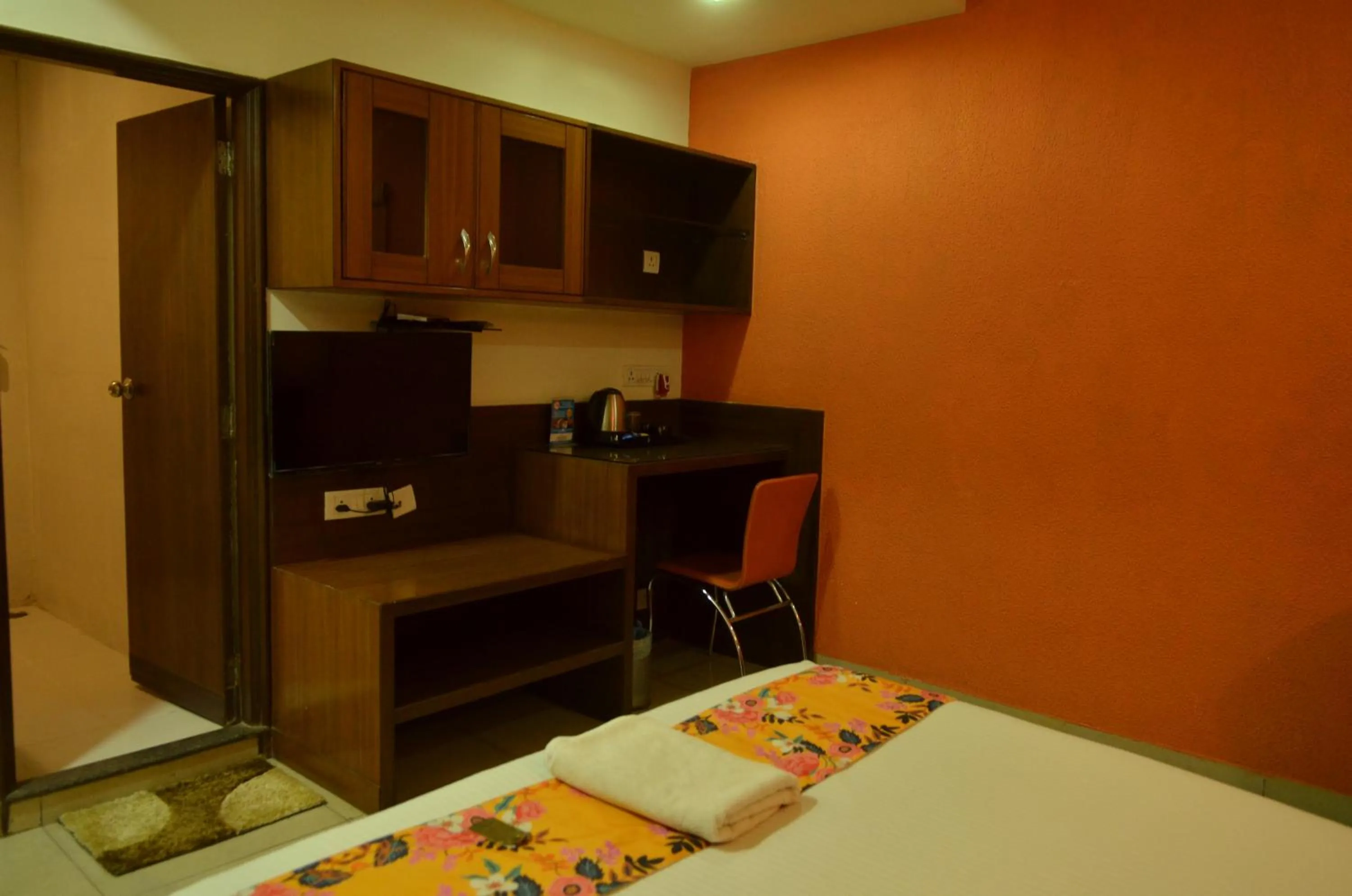 Bed in Cubbon Suites