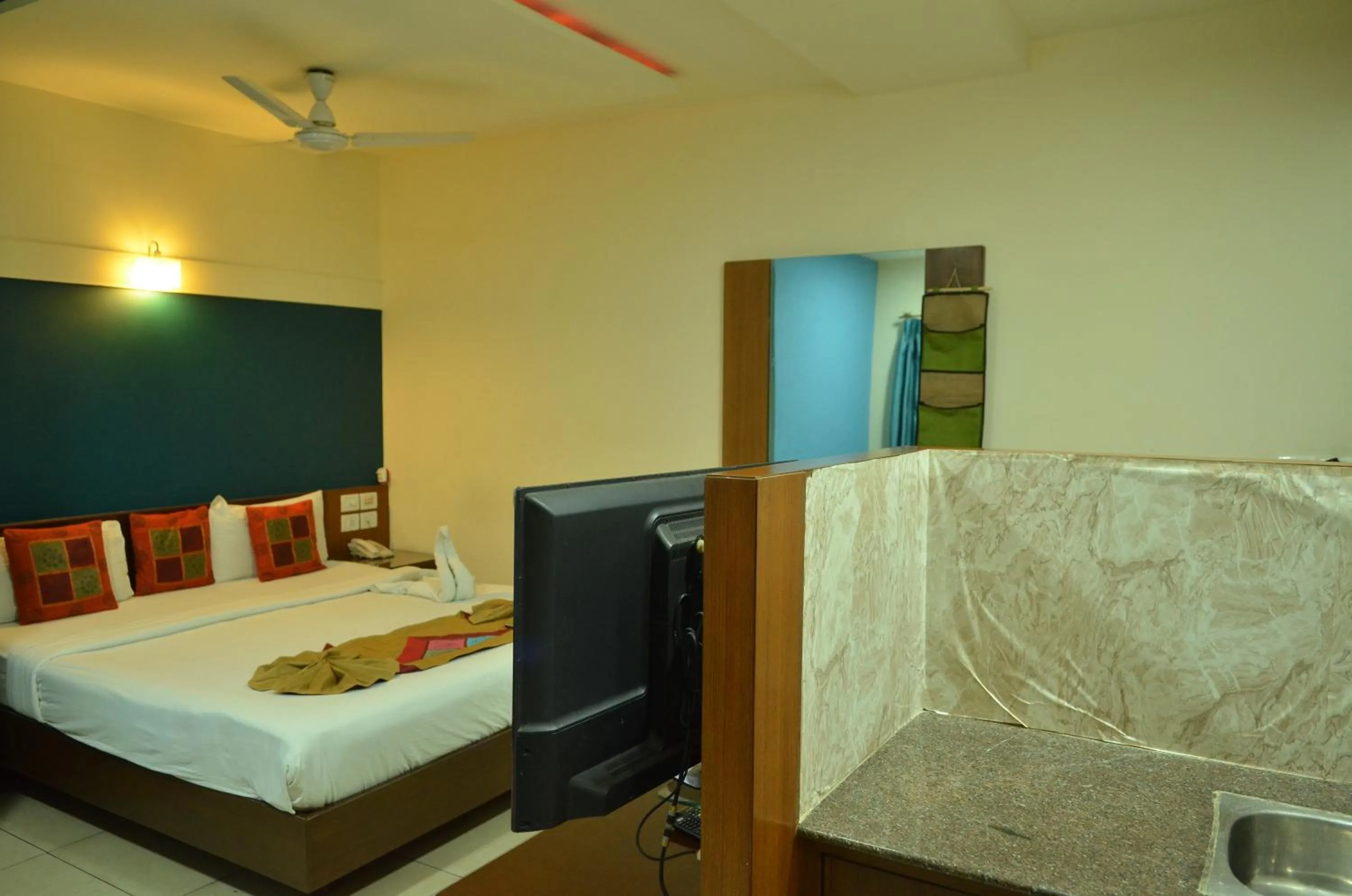Bed in Cubbon Suites