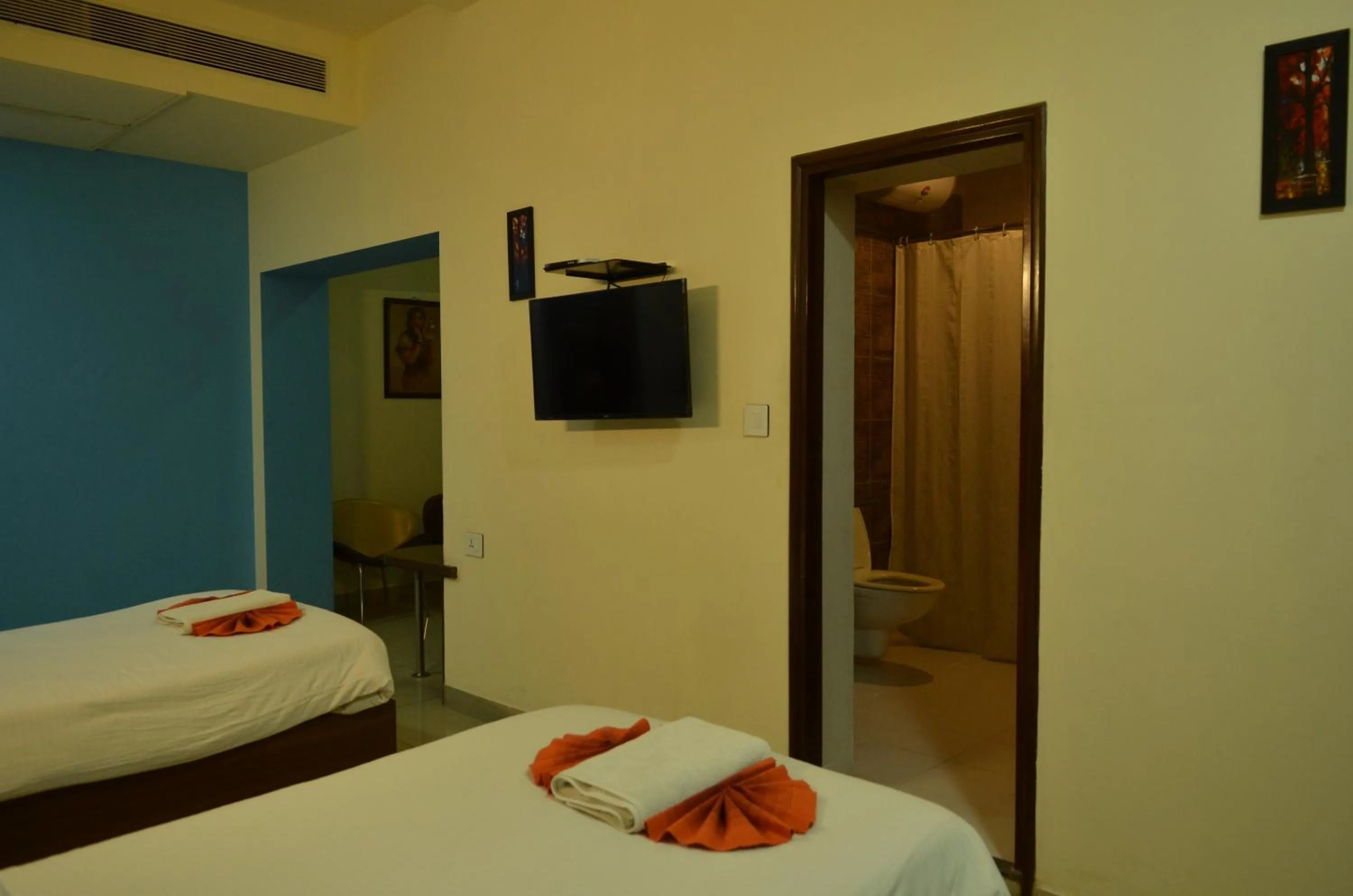 Bed in Cubbon Suites