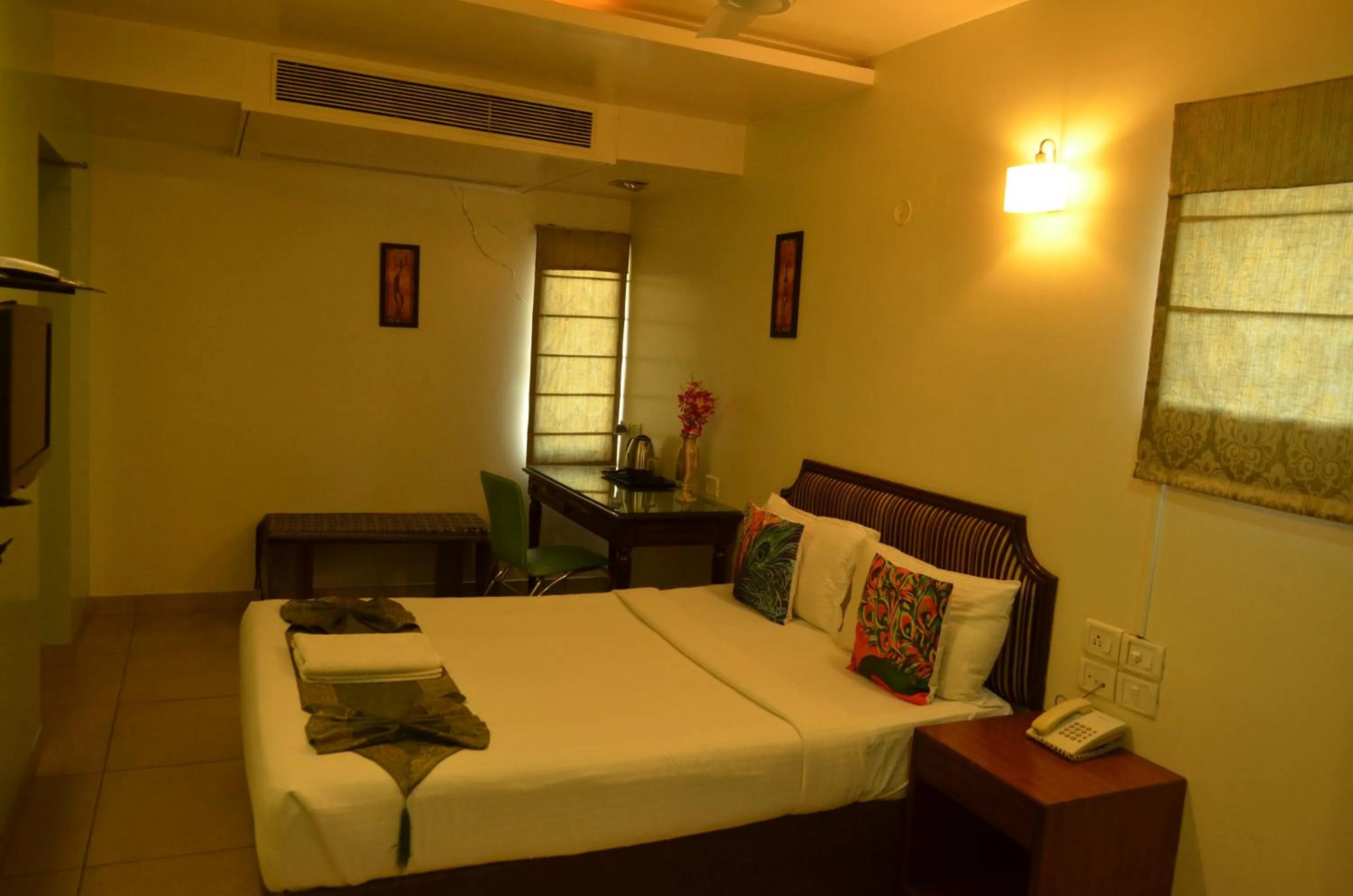 Bed in Cubbon Suites