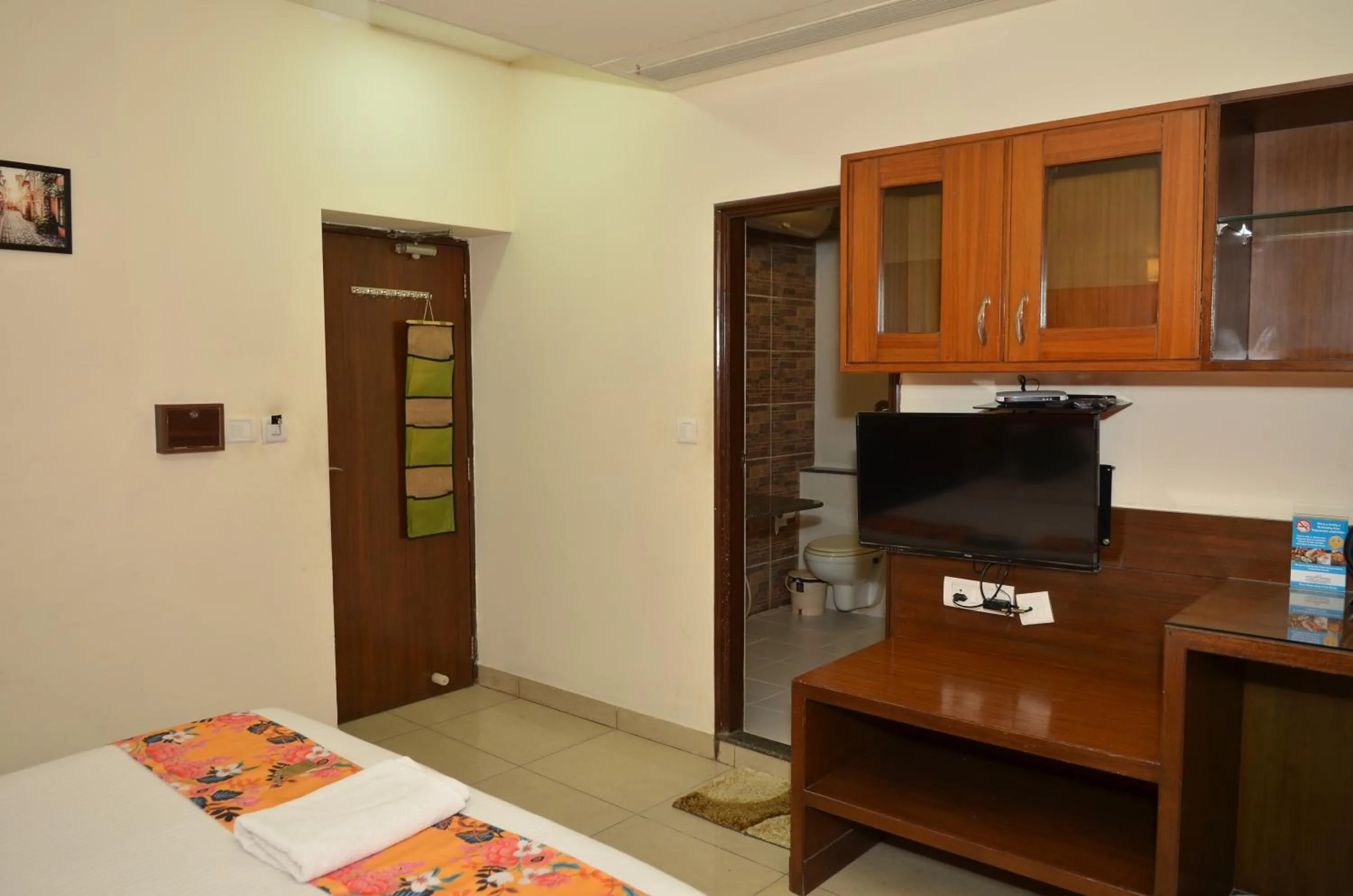 Bed in Cubbon Suites