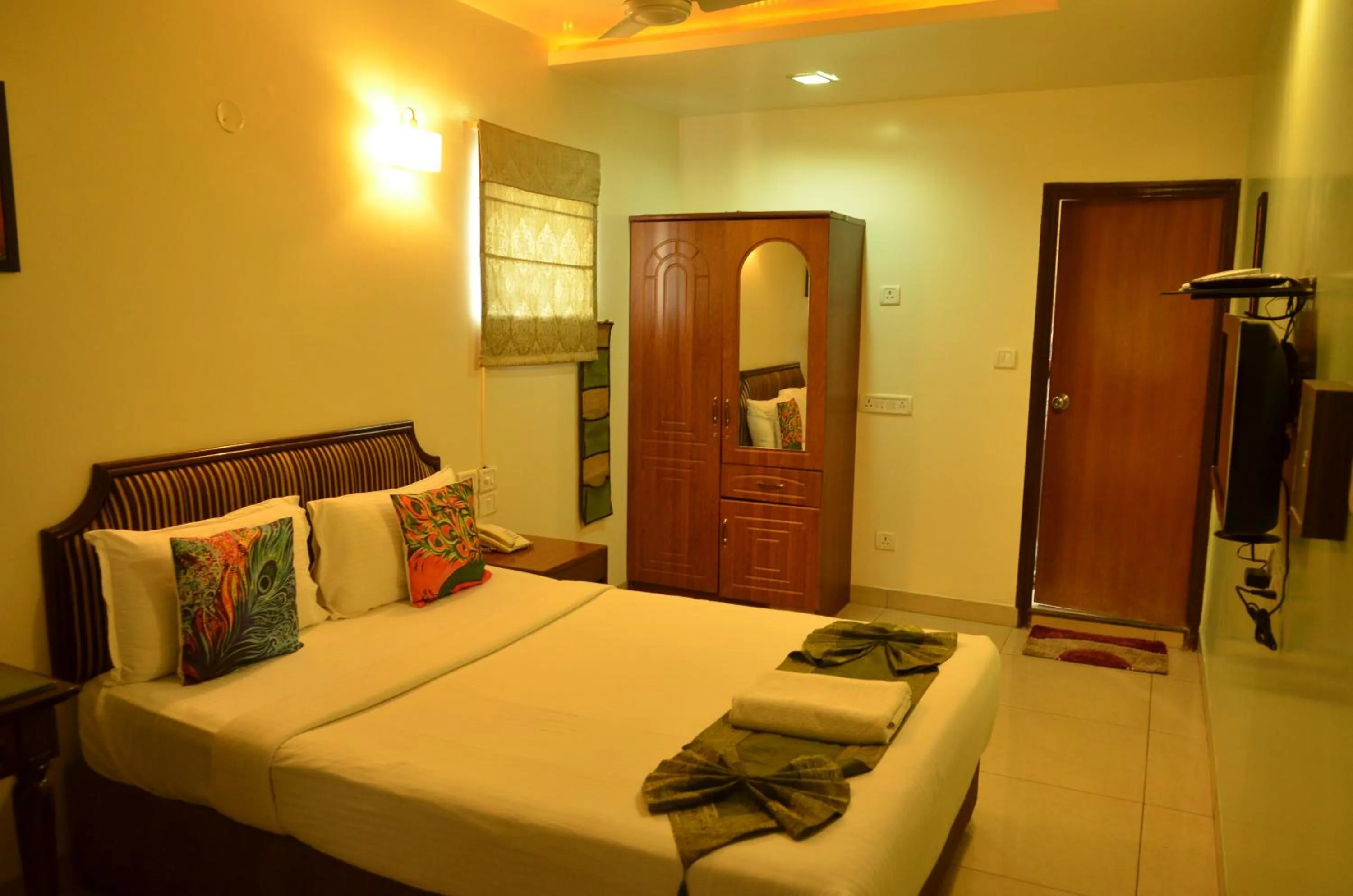 Bed in Cubbon Suites